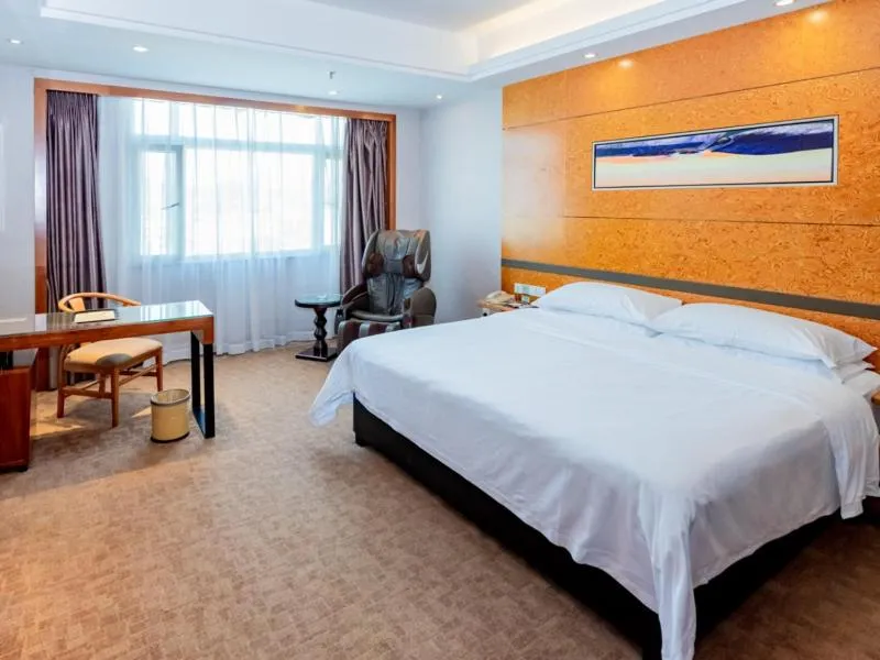 Bed in Vienna Hotel Dongguan Tangxia Binfen Plaza