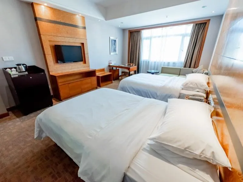 Bed in Vienna Hotel Dongguan Tangxia Binfen Plaza