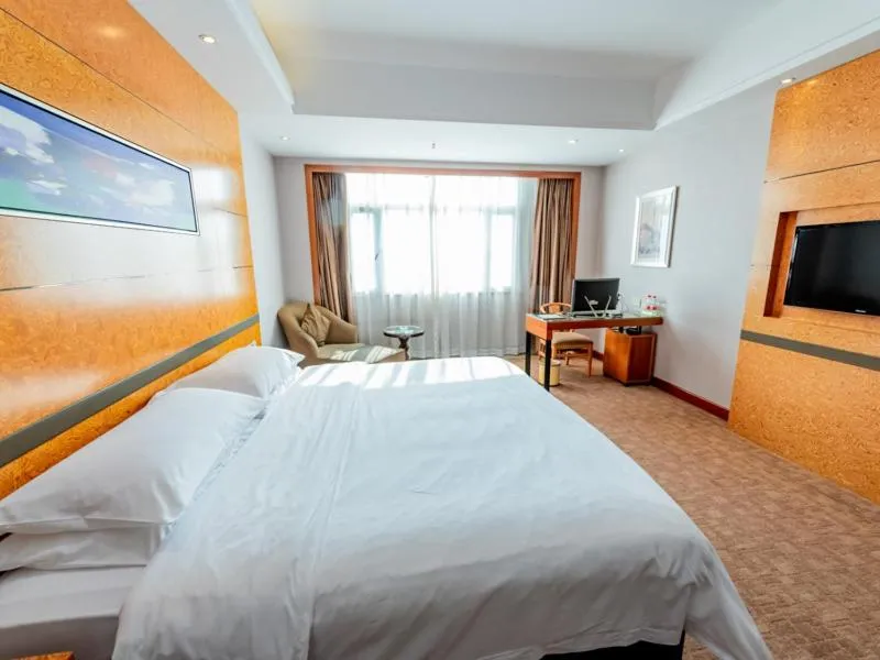 Bed in Vienna Hotel Dongguan Tangxia Binfen Plaza