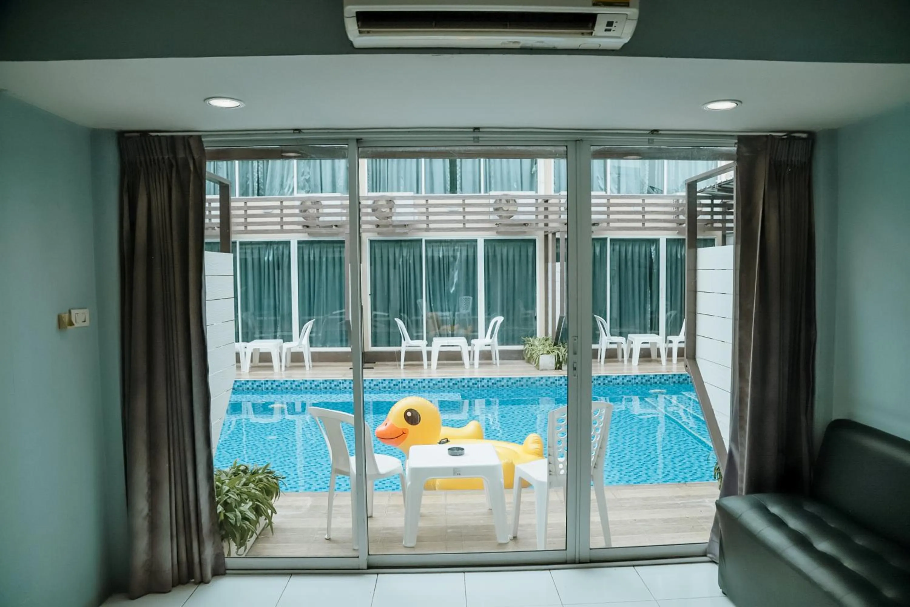 Swimming pool in Full Stop Pool Villa Don Mueang