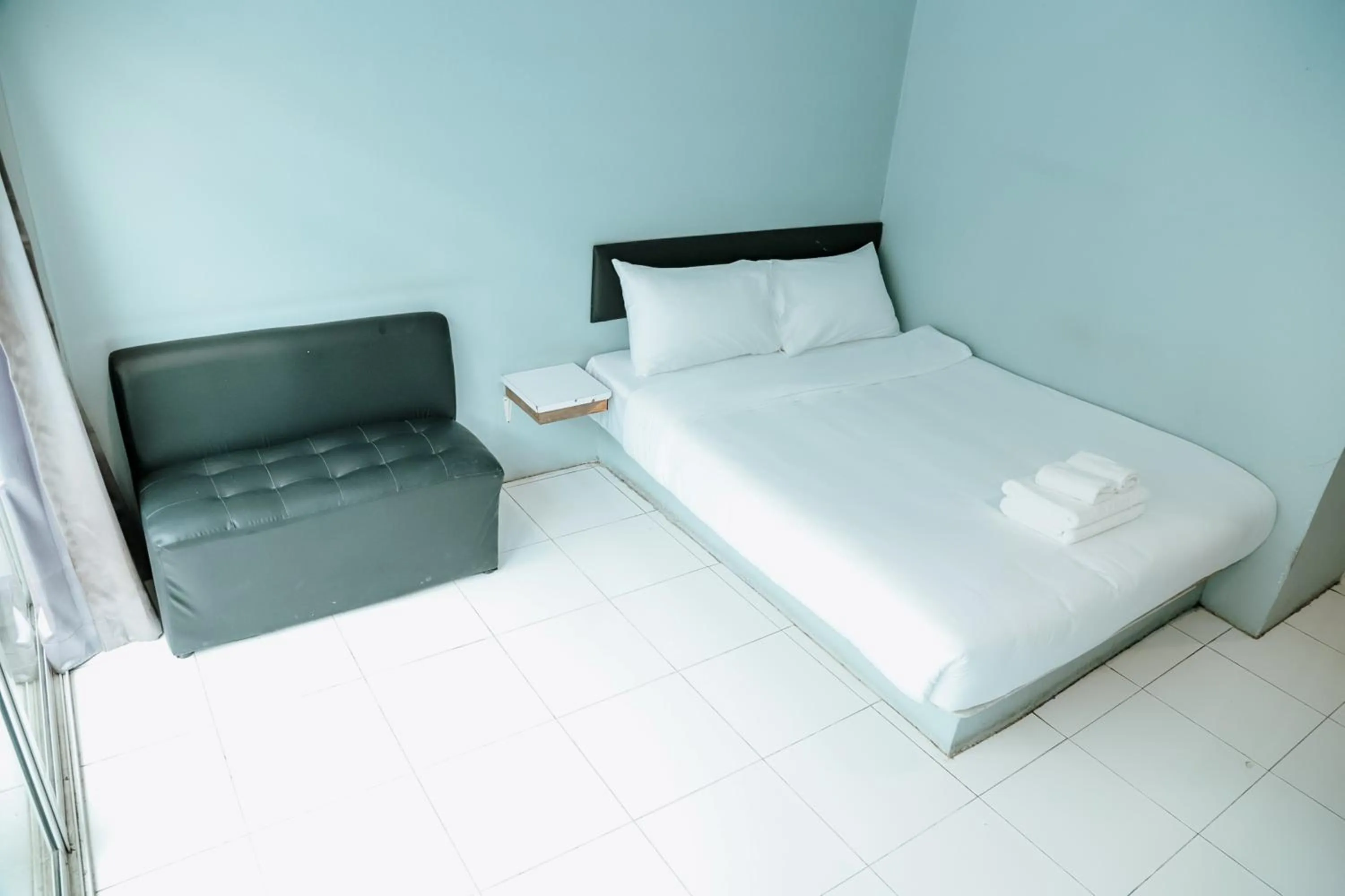 Bed in Full Stop Pool Villa Don Mueang