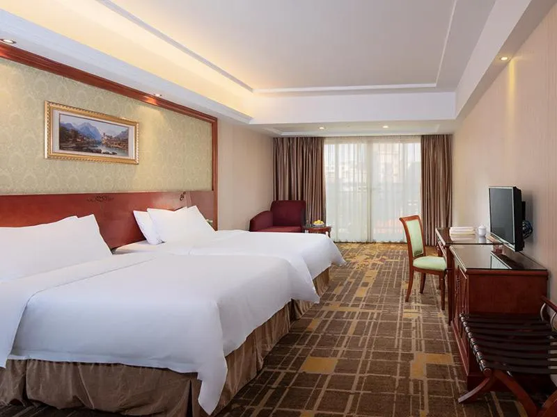 Bed in Vienna Hotel Dongguan Hou street Wanda Plaza