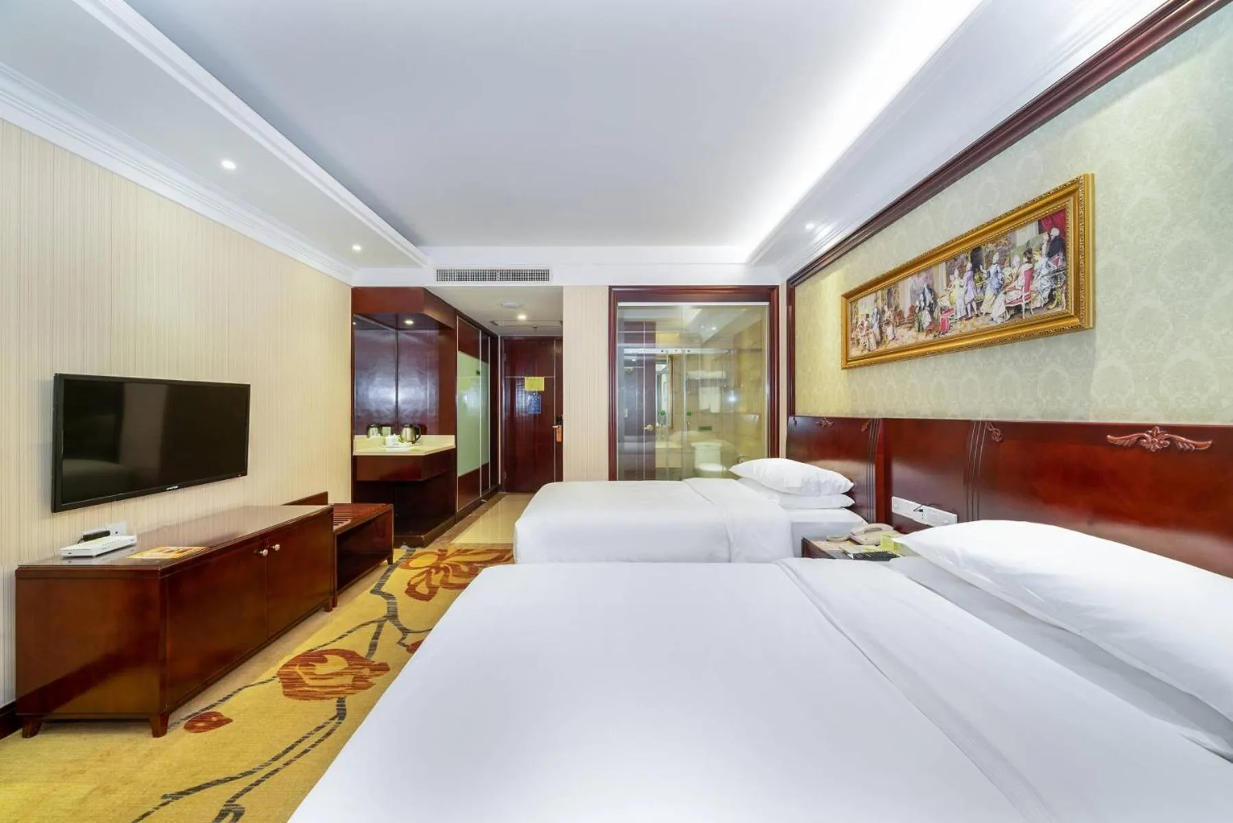 Bed in Vienna Hotel Dongguan Houjie Exhibition Center