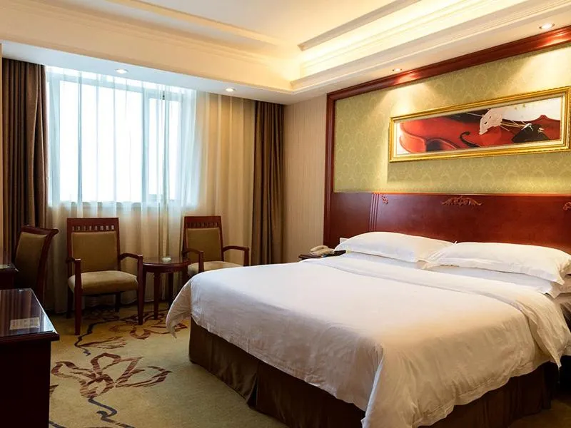 Bed in Vienna Hotel Foshan Jihua Road
