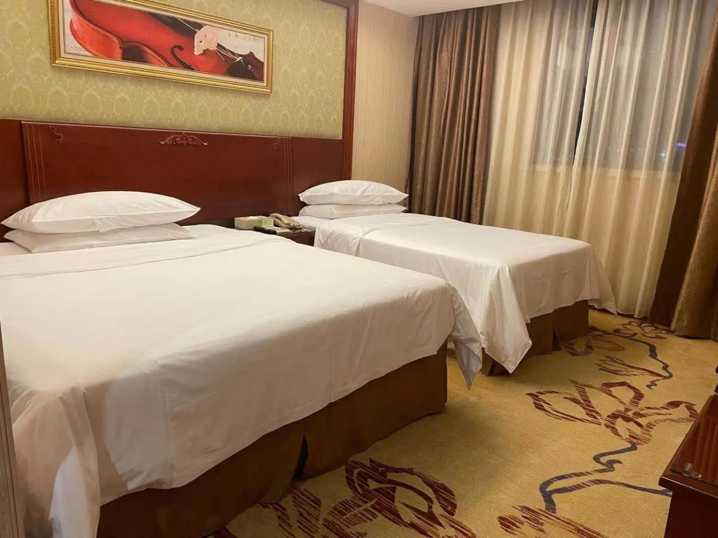 Bed in Vienna Hotel Foshan Jihua Road