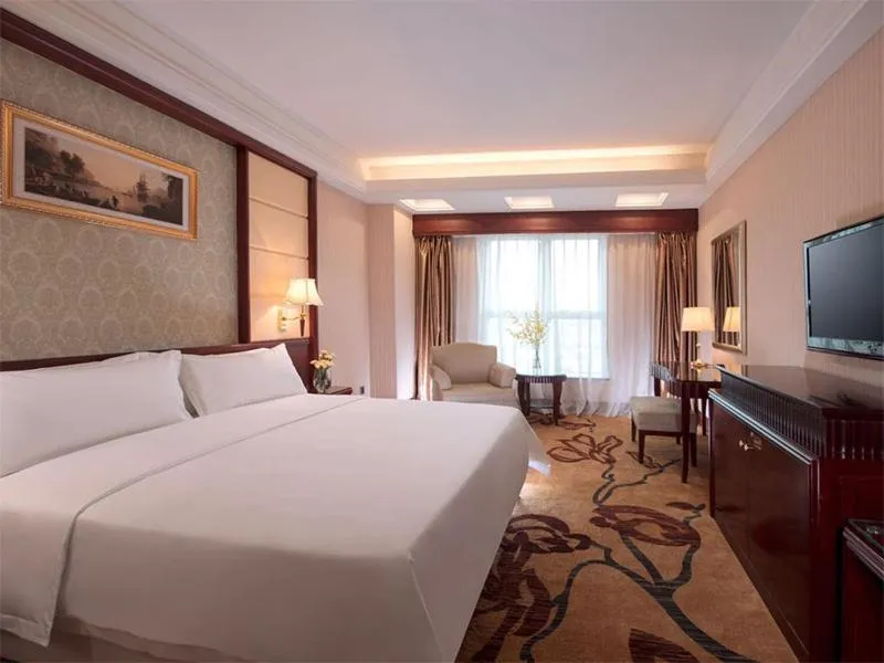 Bed in Vienna Hotel Foshan Nanzhuang Avenue