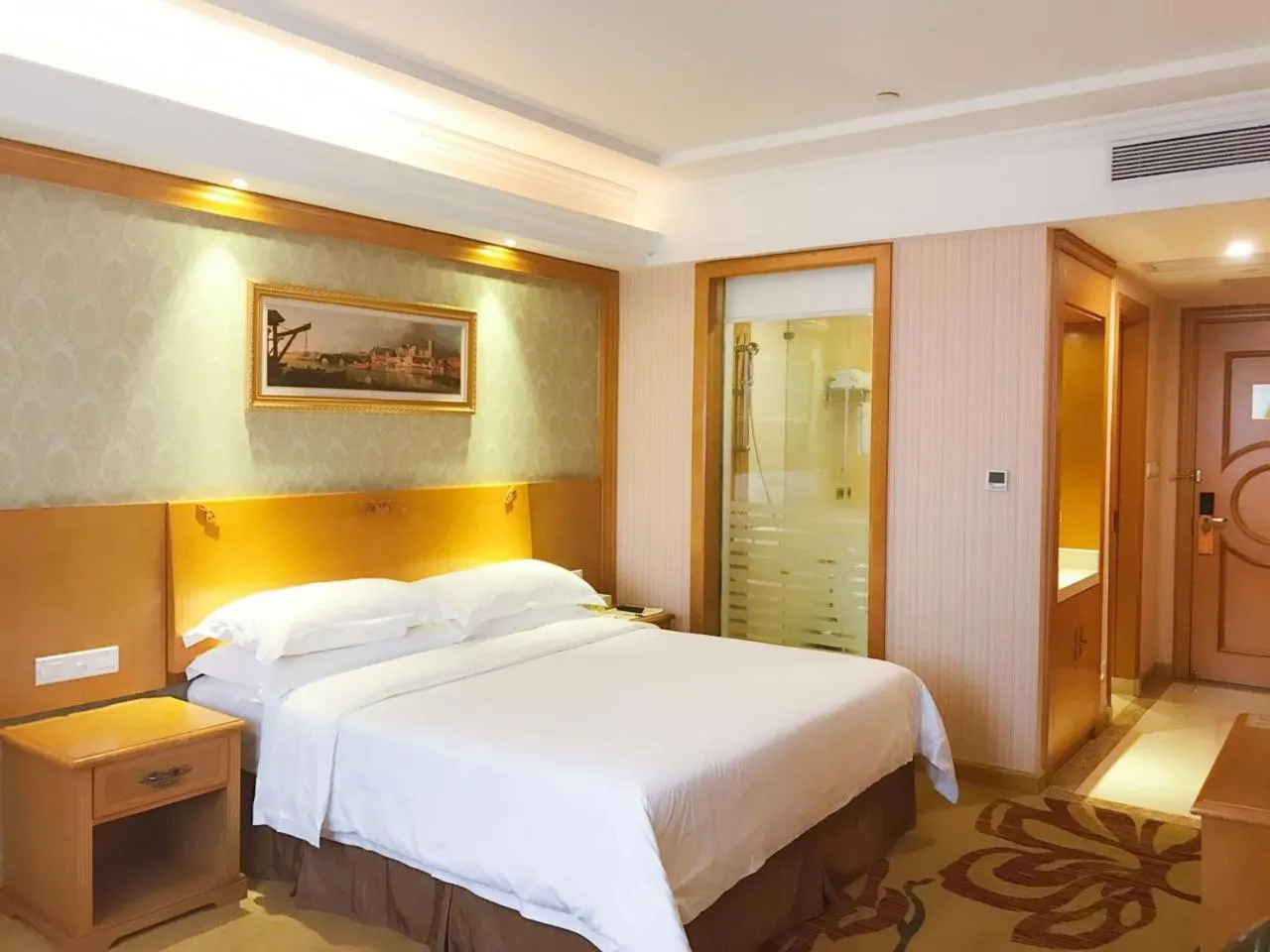 Bed in Vienna Hotel Foshan Nanzhuang Avenue