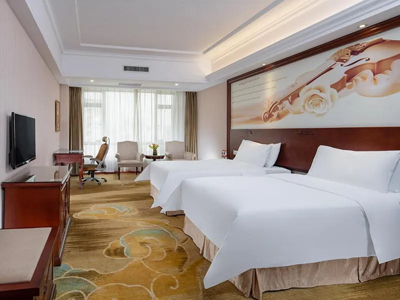 Bed in Vienna Hotel Foshan Huangqi