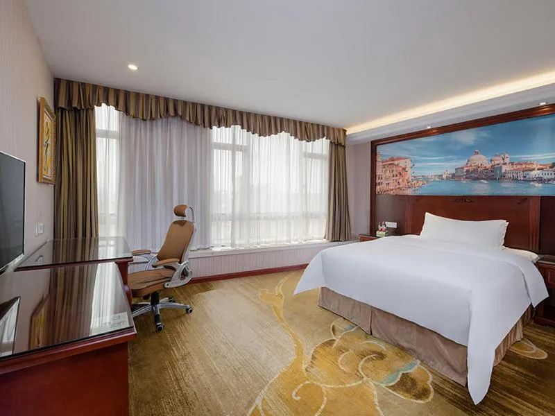 Bed in Vienna Hotel Foshan Huangqi