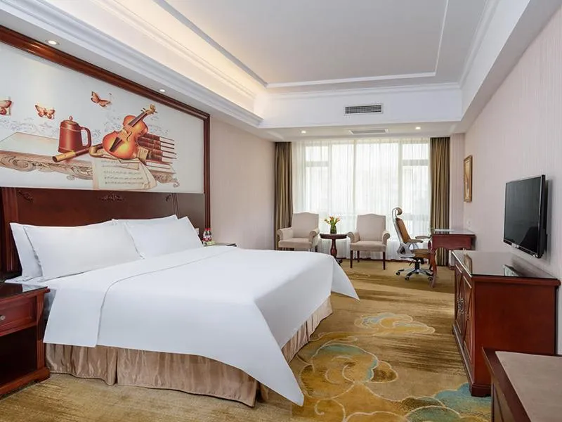 Bed in Vienna Hotel Foshan Huangqi