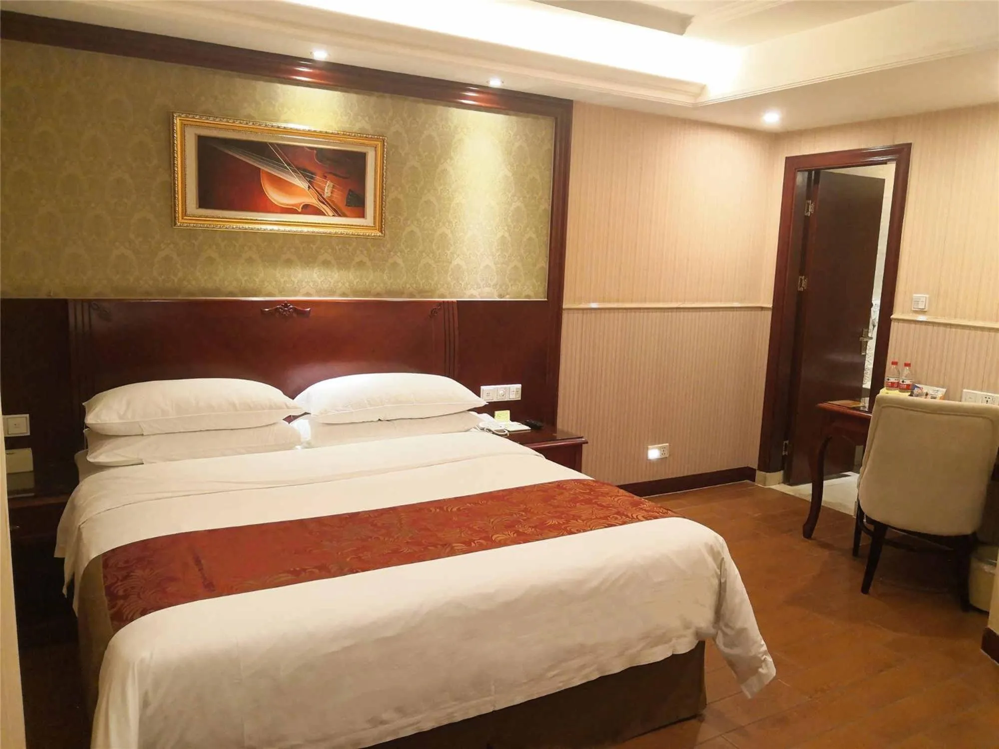 Bed in Vienna Hotel Shunde Longjia Exhibition Center
