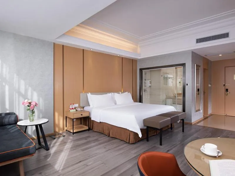 Bed in Vienna International Hotel Zhongshan Shiqi Kanghua Road