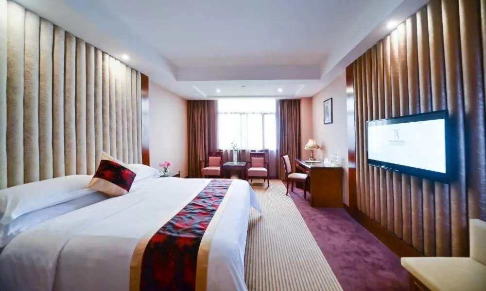 Bed in Vienna Hotel Nanning Jiangnan Wanda