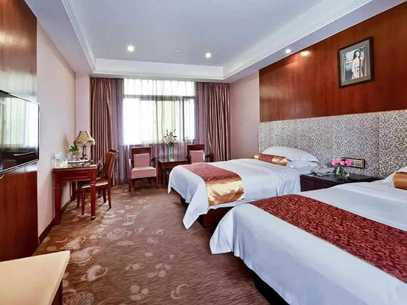 Bed in Vienna Hotel Nanning Jiangnan Wanda