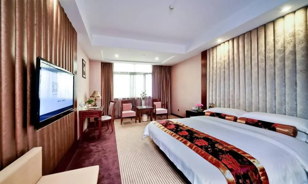 Bed in Vienna Hotel Nanning Jiangnan Wanda