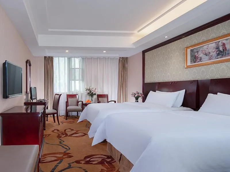 Bed in Vienna Hotel Guiyang Exhibition Center