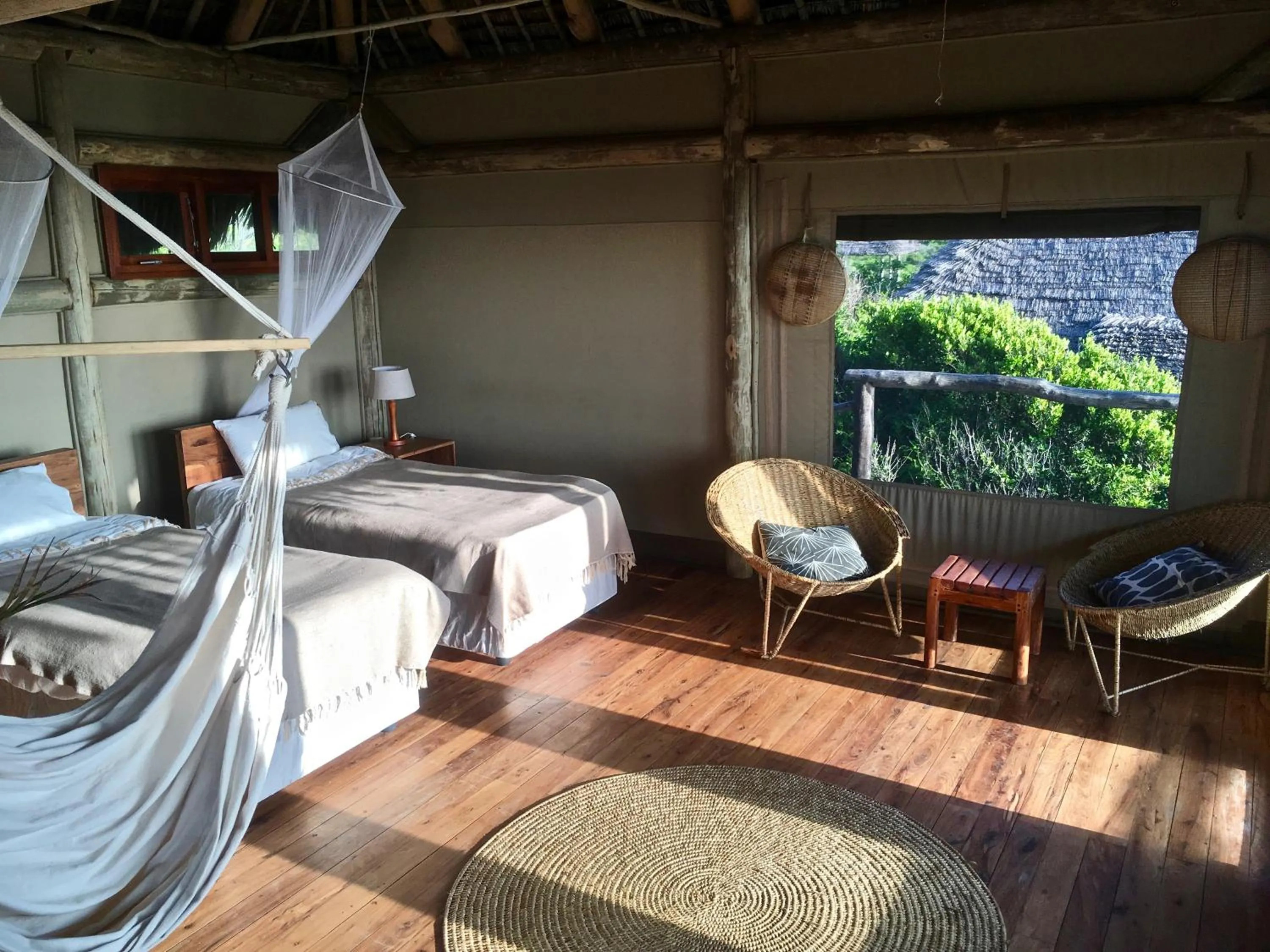 Bed in Travessia Beach Lodge