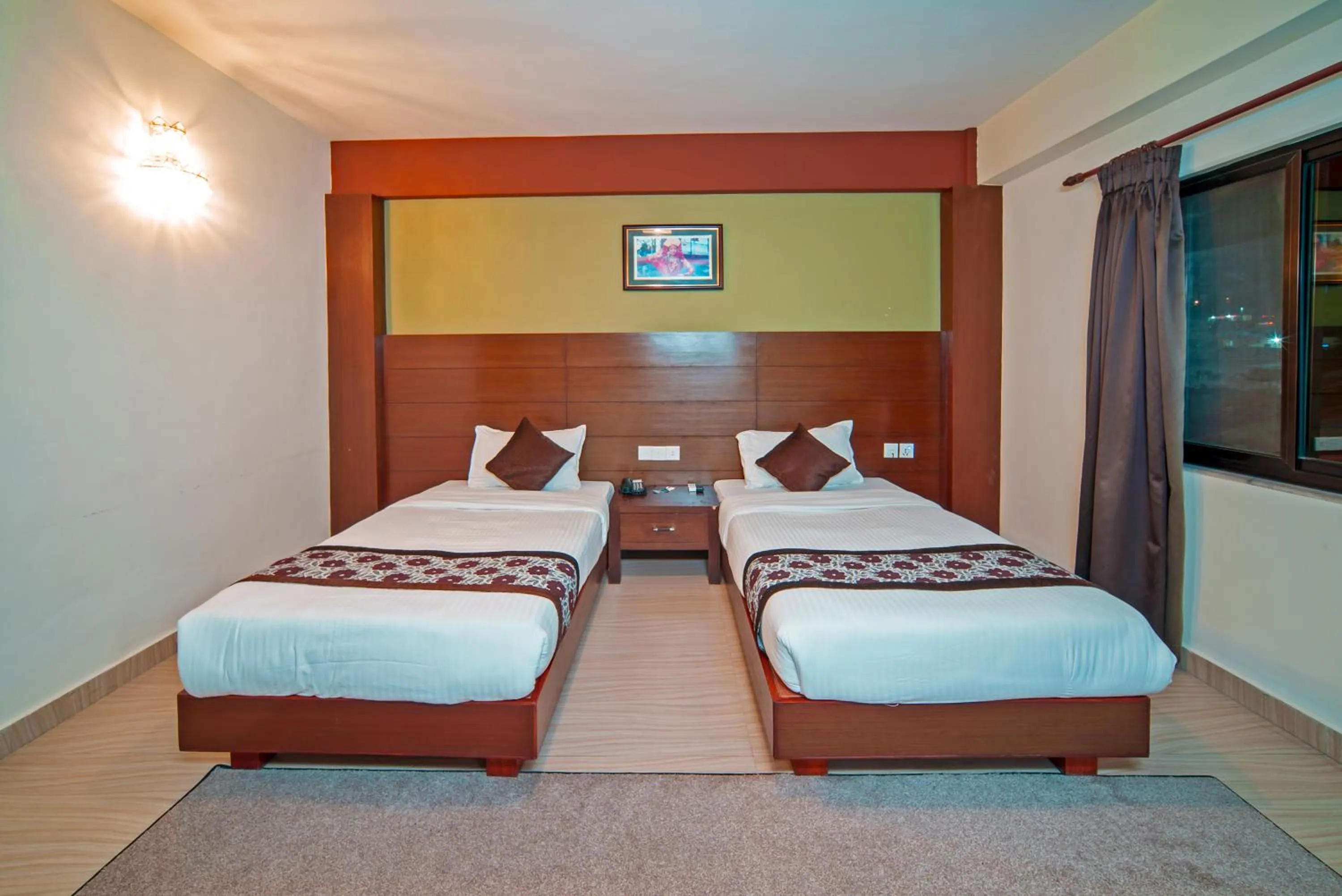 Bed in Kumari Star Inn