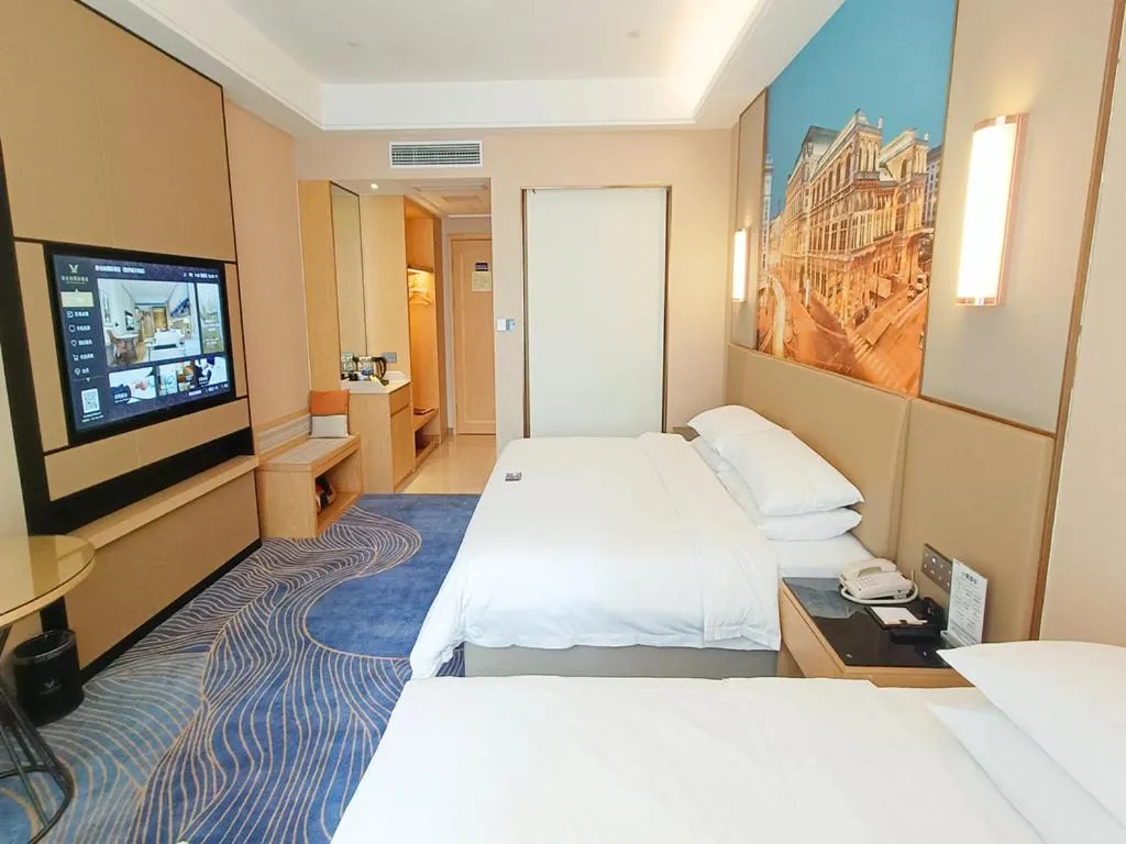 Bed in Vienna International Hotel Jingzhou New World