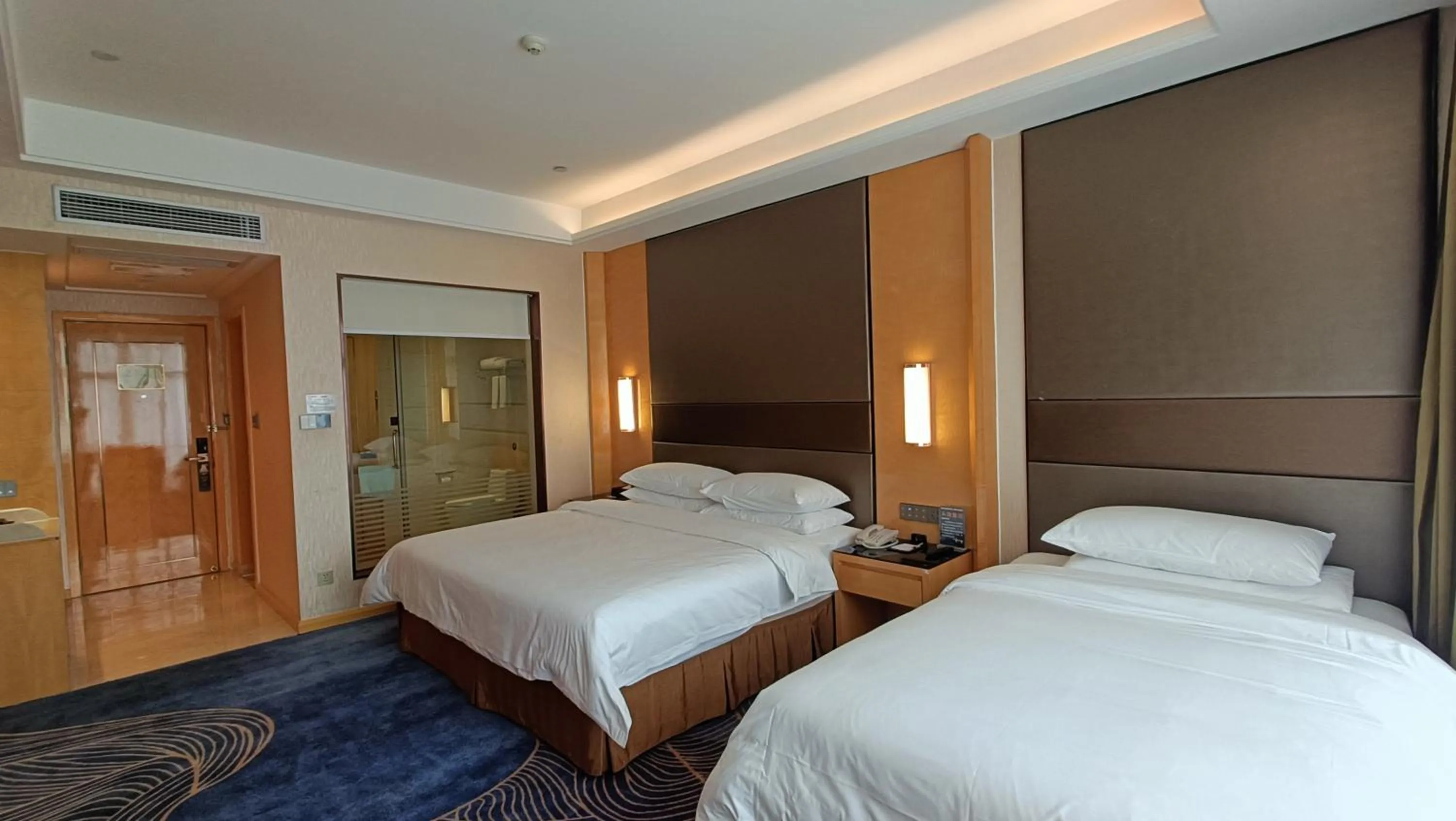 Bed in Vienna International Hotel Jingzhou New World