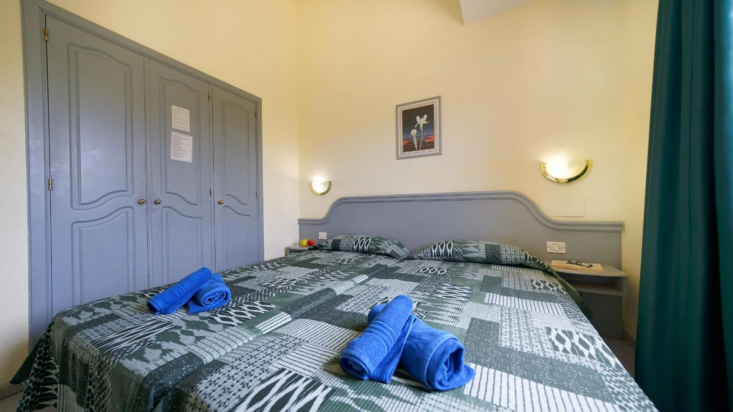 Bedroom, Bed in Bungalows Maspalomas Oasis Club - All Inclusive.