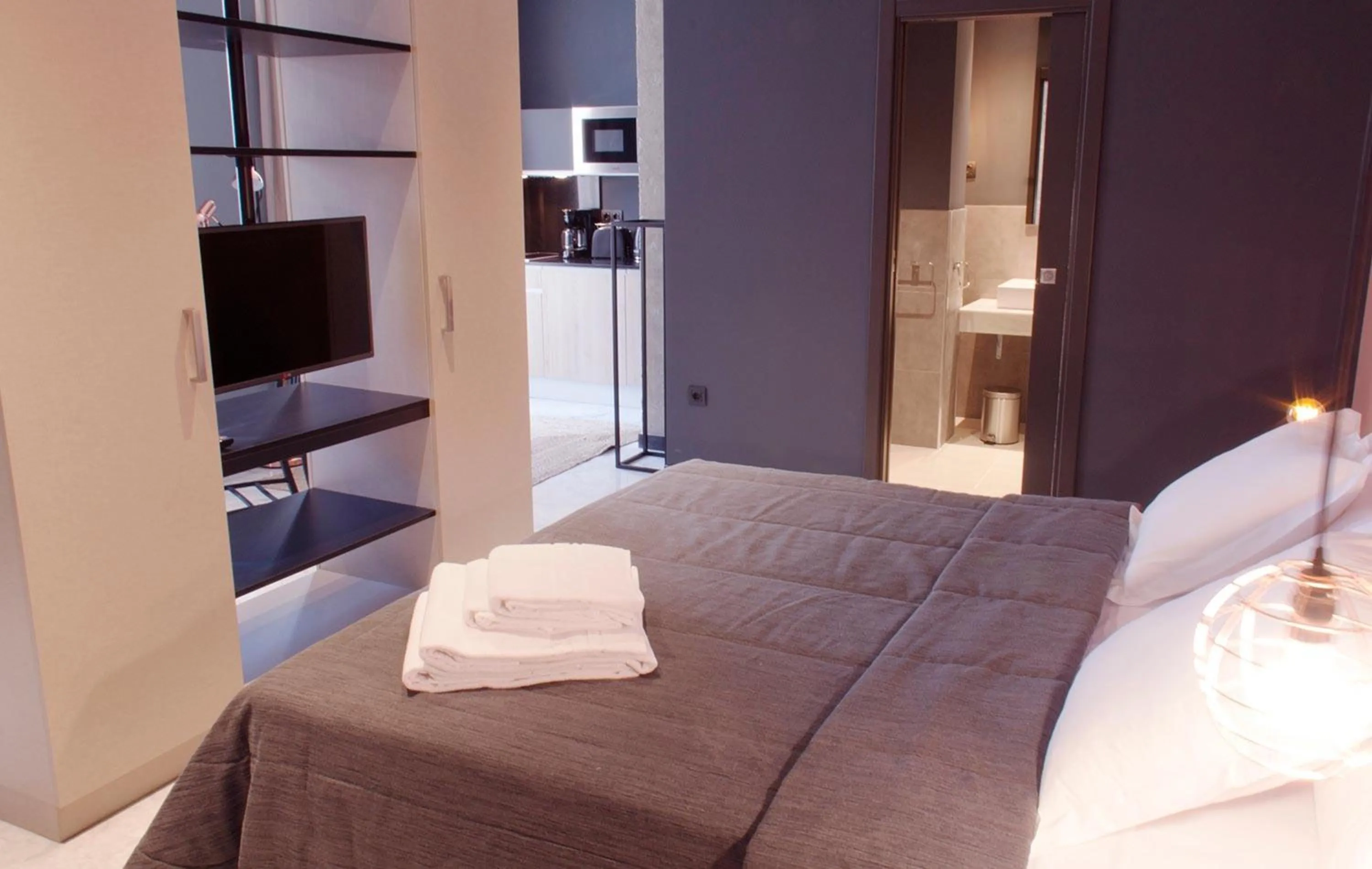 Bedroom, Bed in Apartamentos NONO by Charming Stay