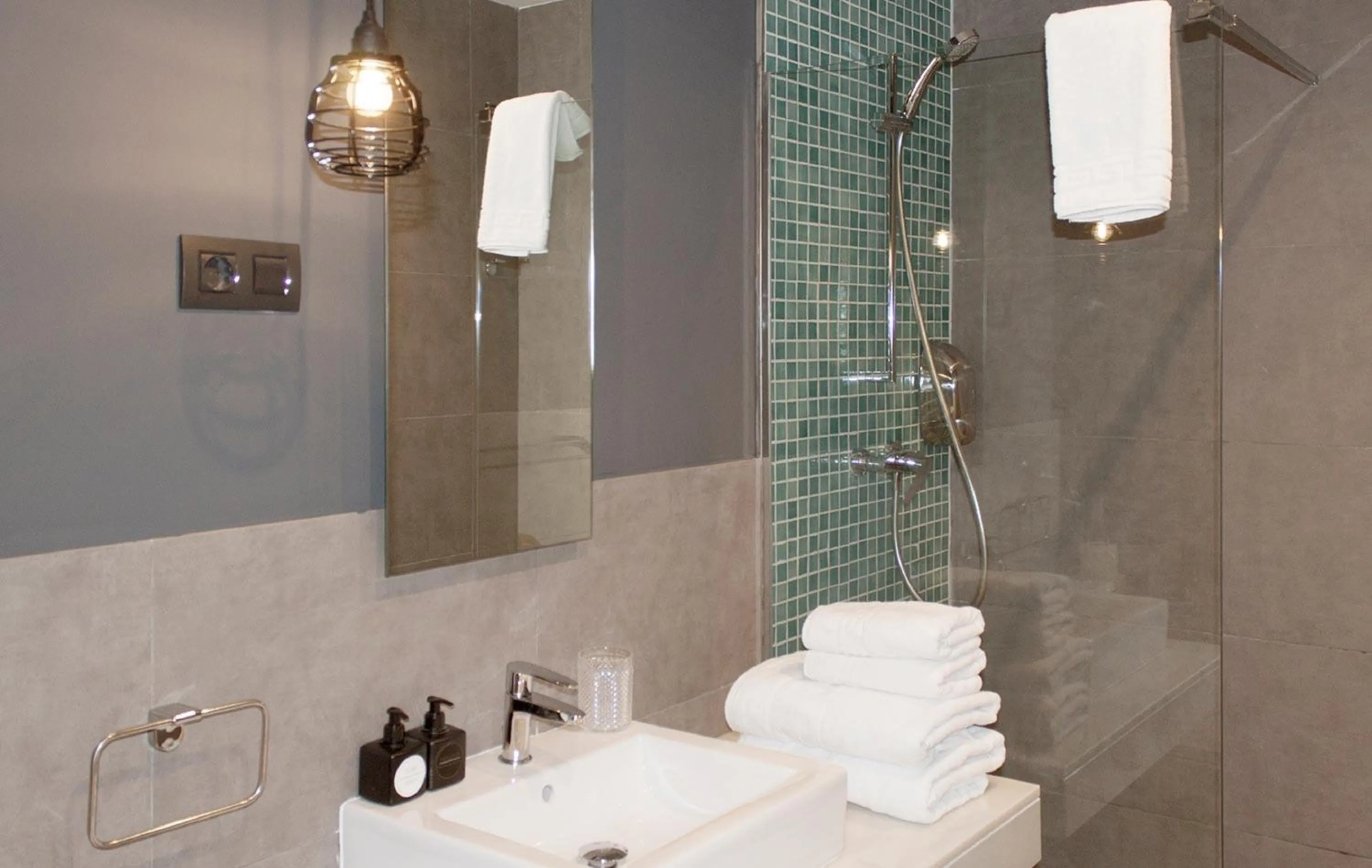 Bathroom in Apartamentos NONO by Charming Stay