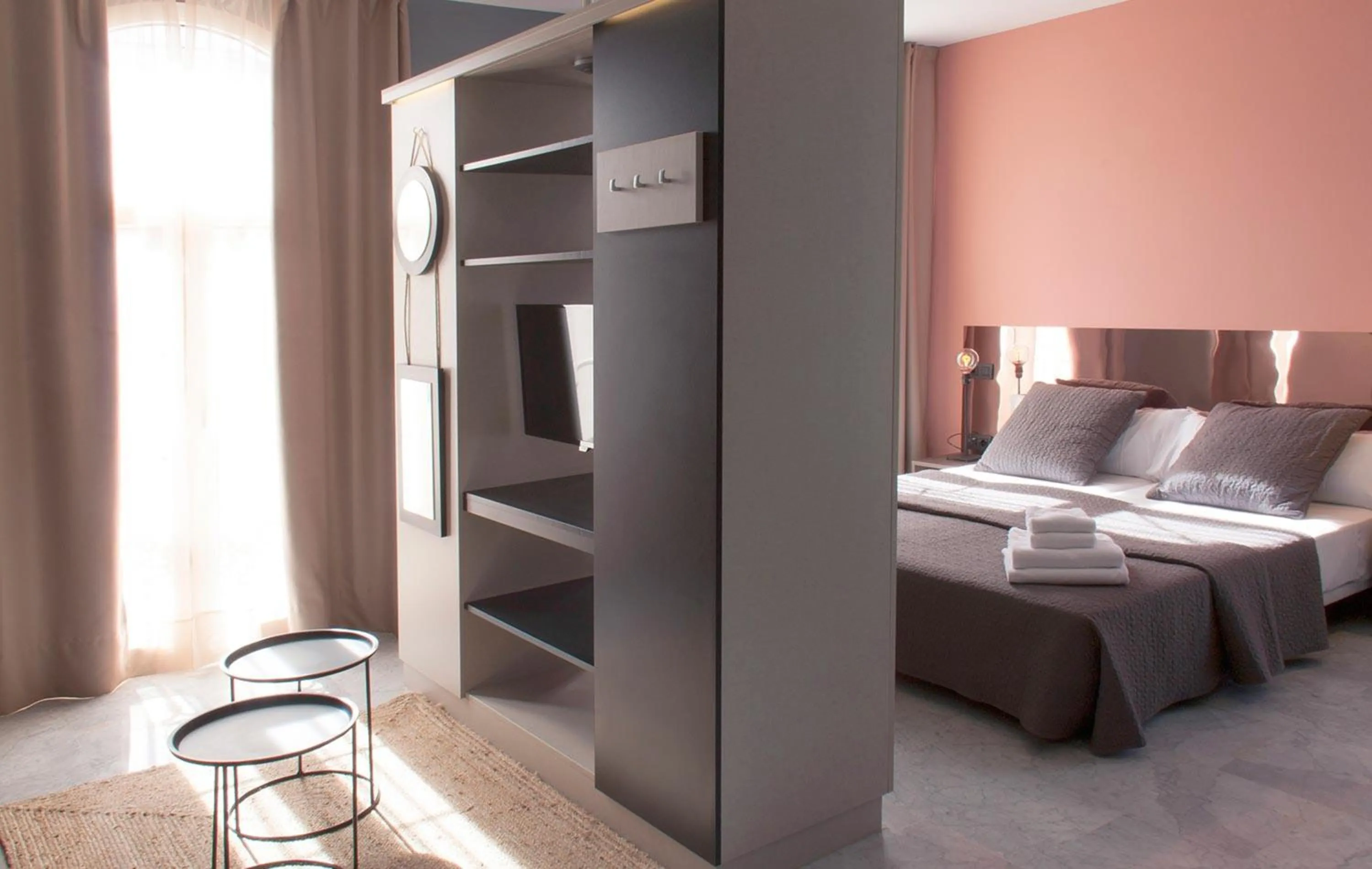 Bedroom, Bed in Apartamentos NONO by Charming Stay