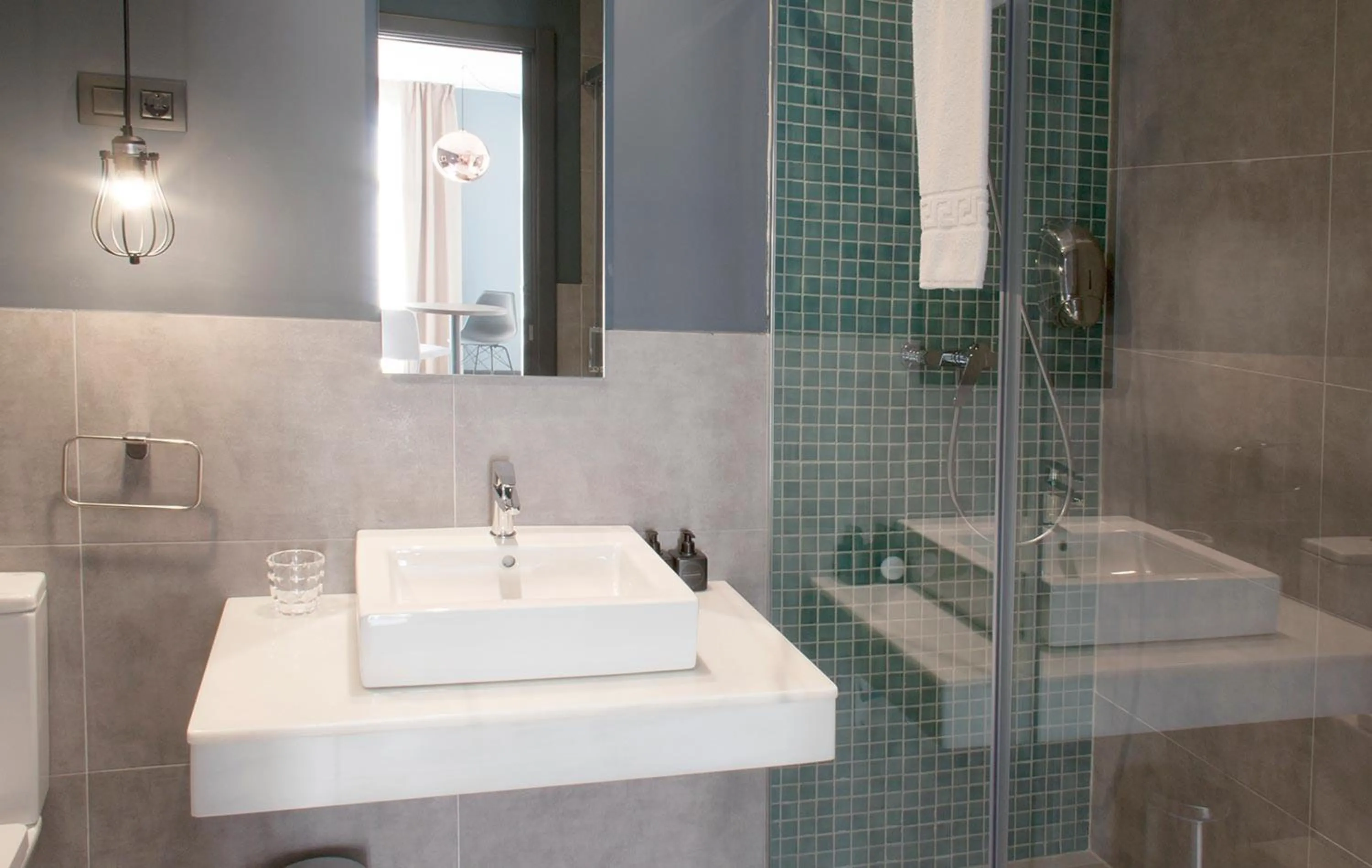 Bathroom in Apartamentos NONO by Charming Stay