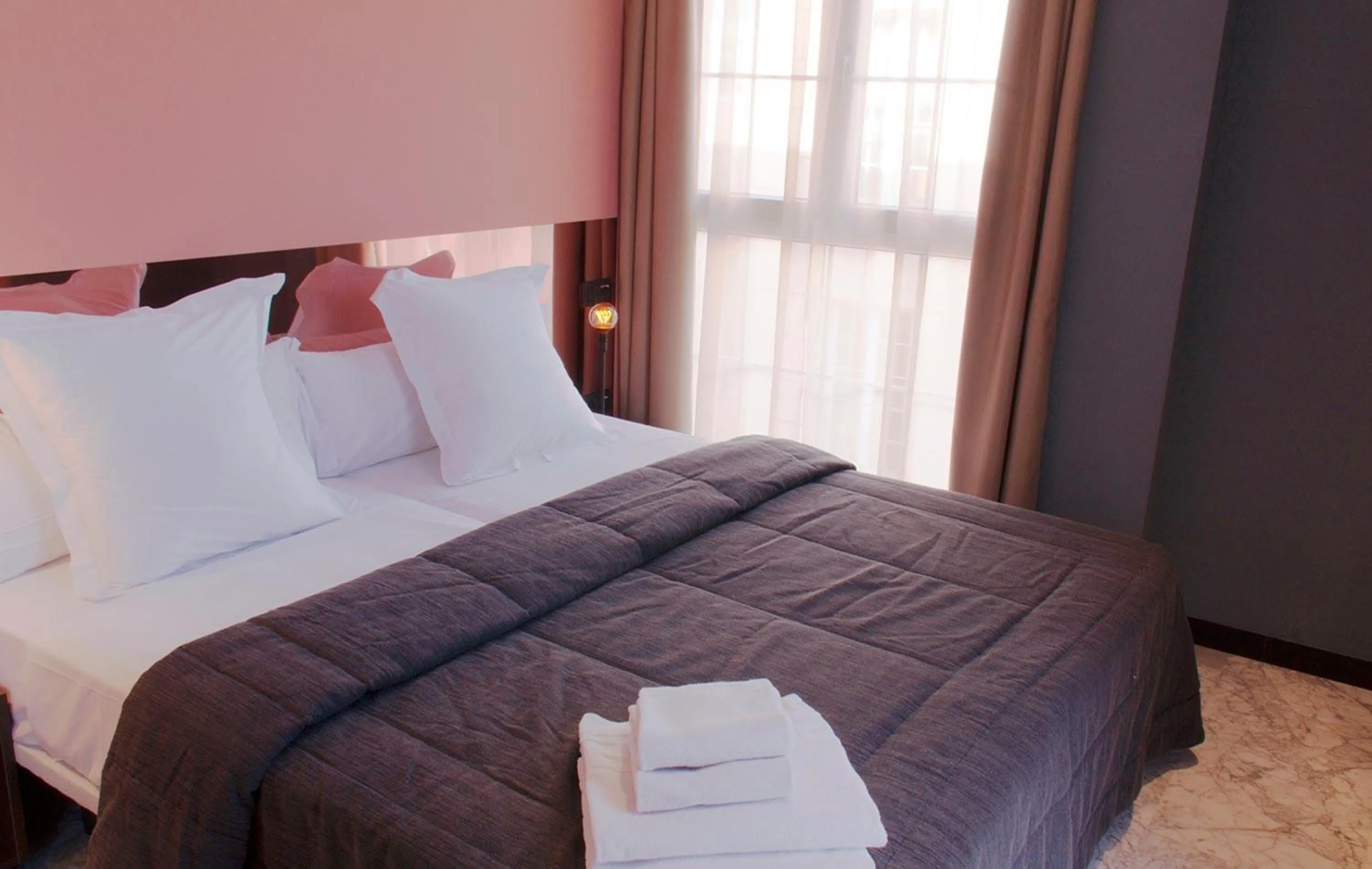 Bedroom, Bed in Apartamentos NONO by Charming Stay