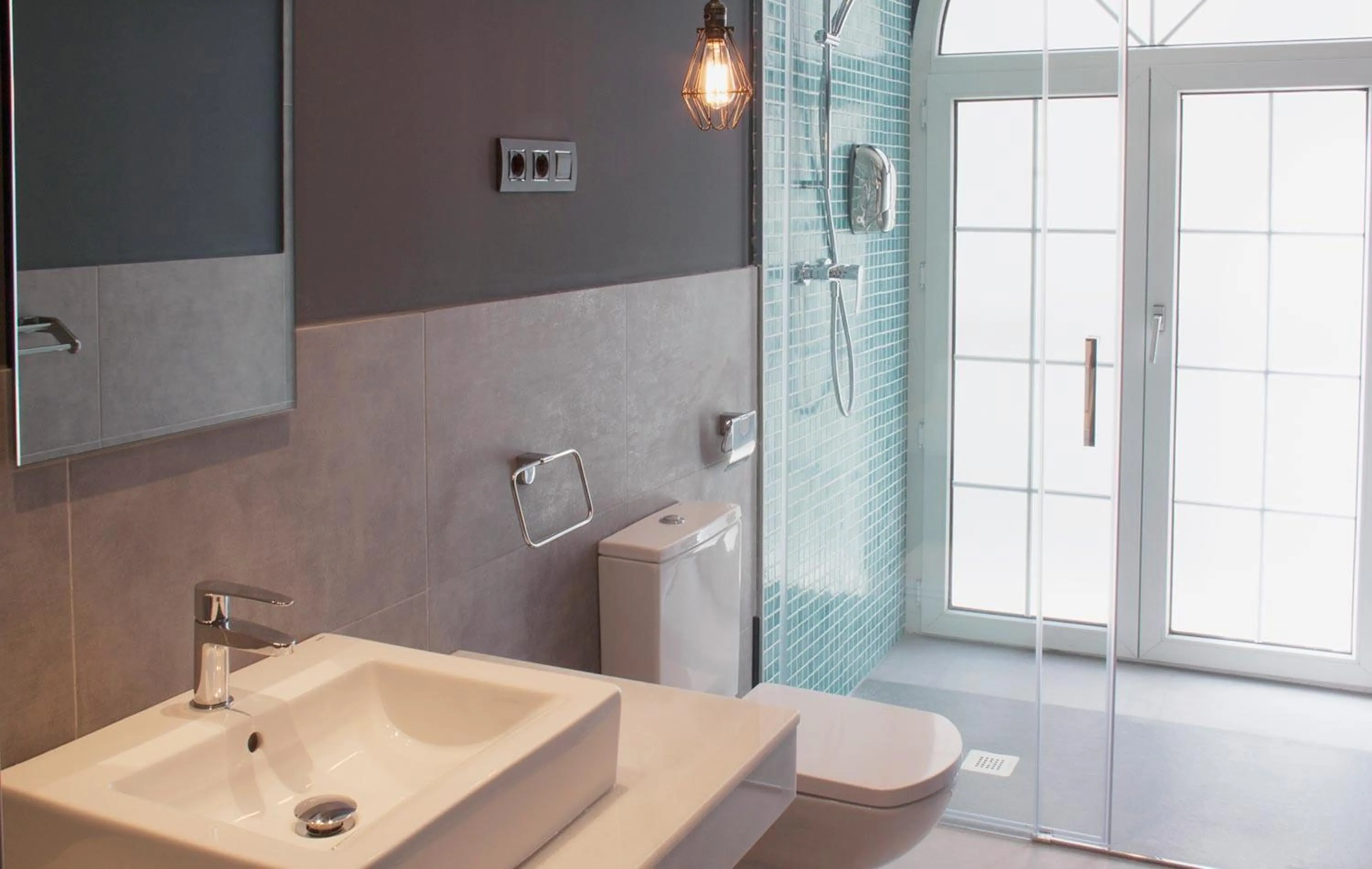 Shower in Apartamentos NONO by Charming Stay