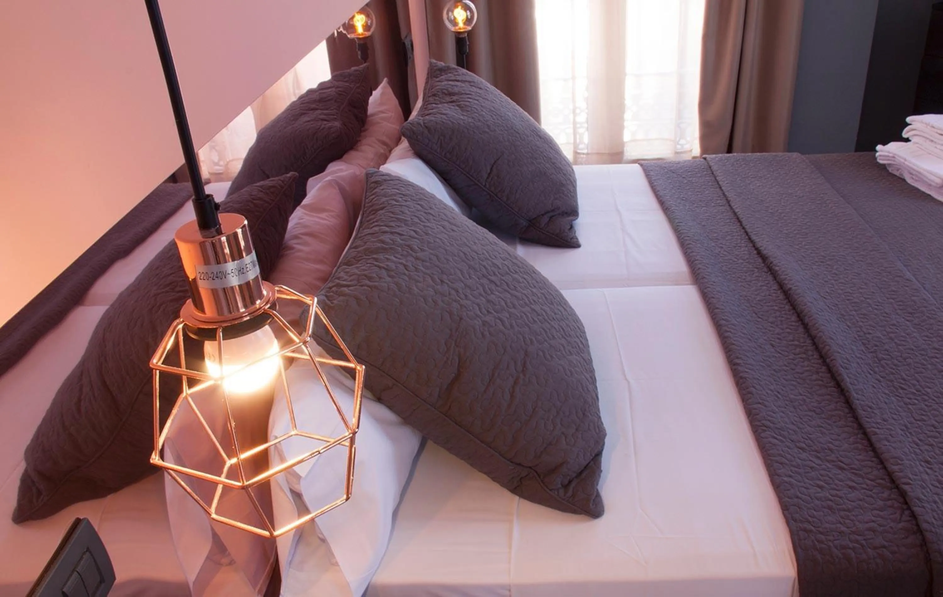 Bedroom, Bed in Apartamentos NONO by Charming Stay