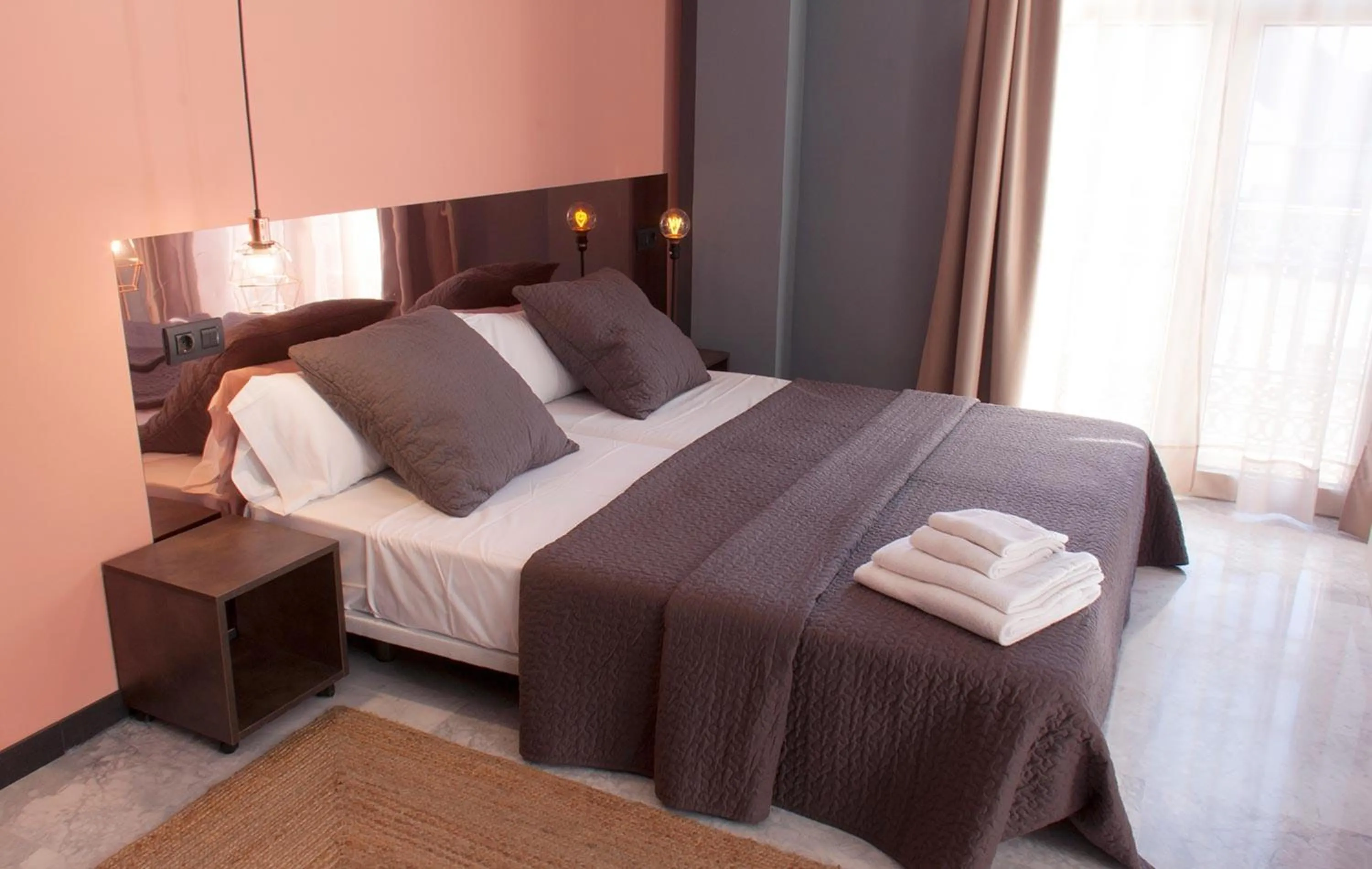 Bathroom, Bed in Apartamentos NONO by Charming Stay