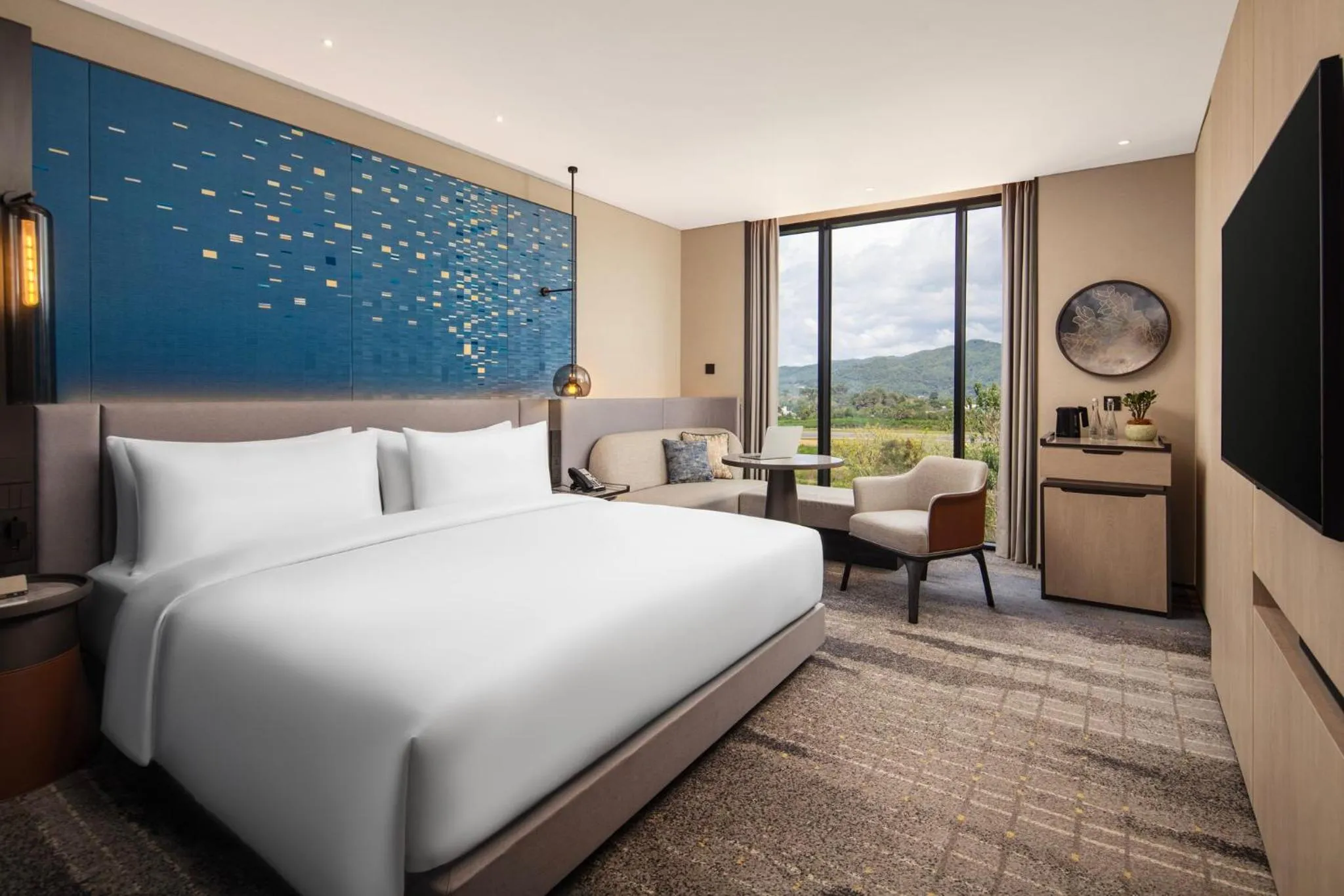 Photo of the whole room, Bed in Crowne Plaza Labuan Bajo by IHG