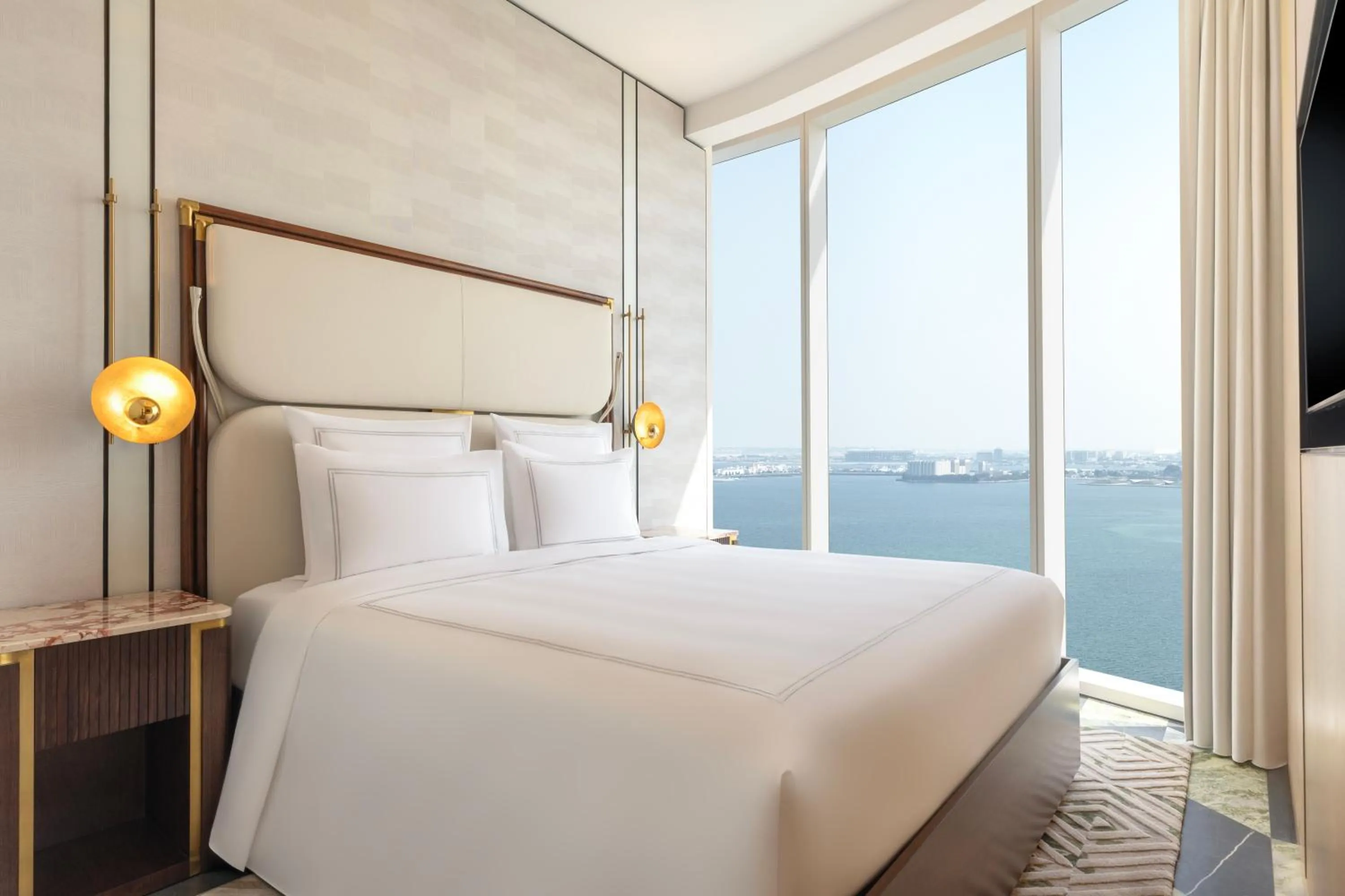 Bed in Swissôtel Corniche Park Towers Doha