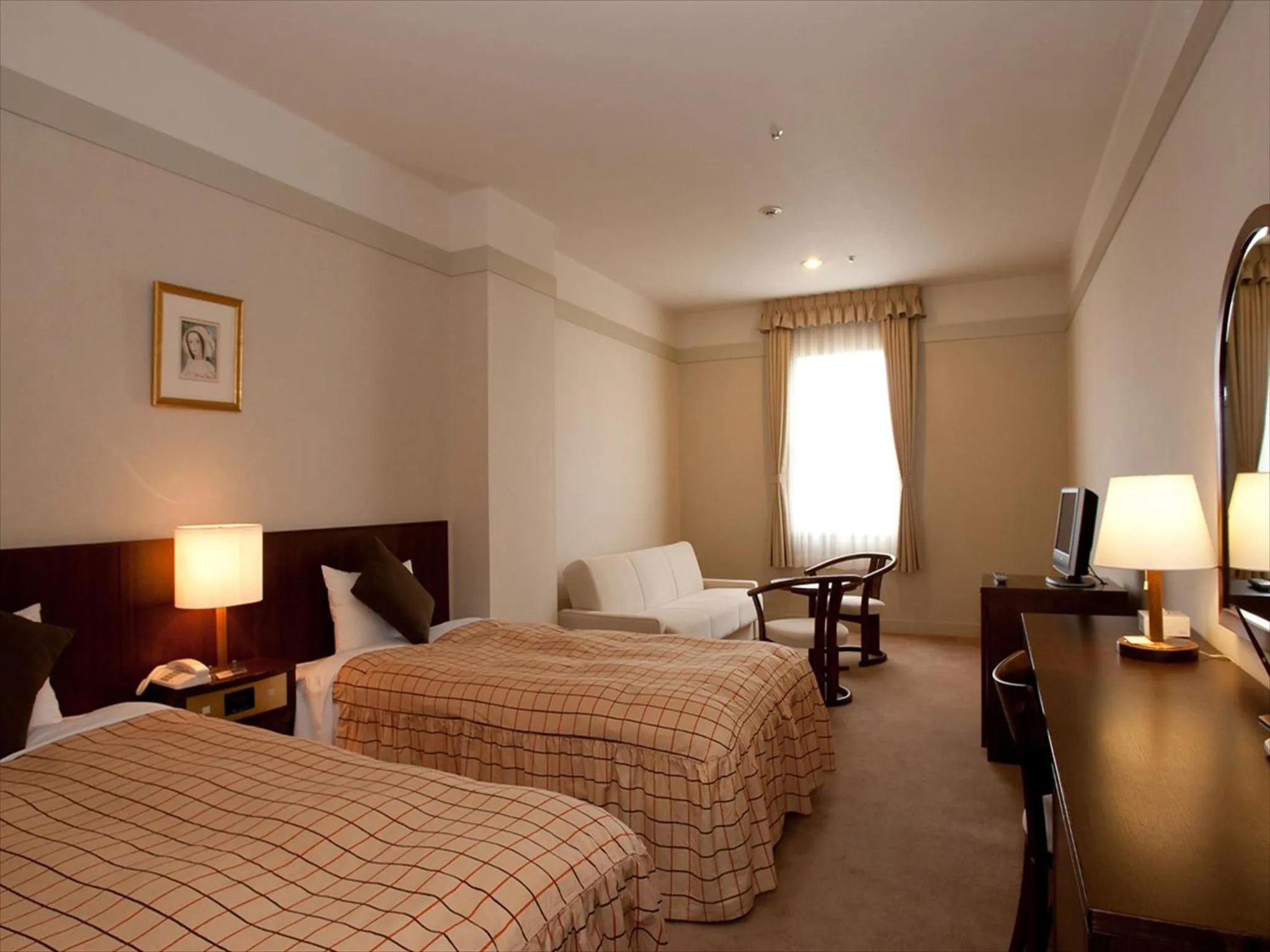 Bed in Yugashima Golf Club & Hotel Resort