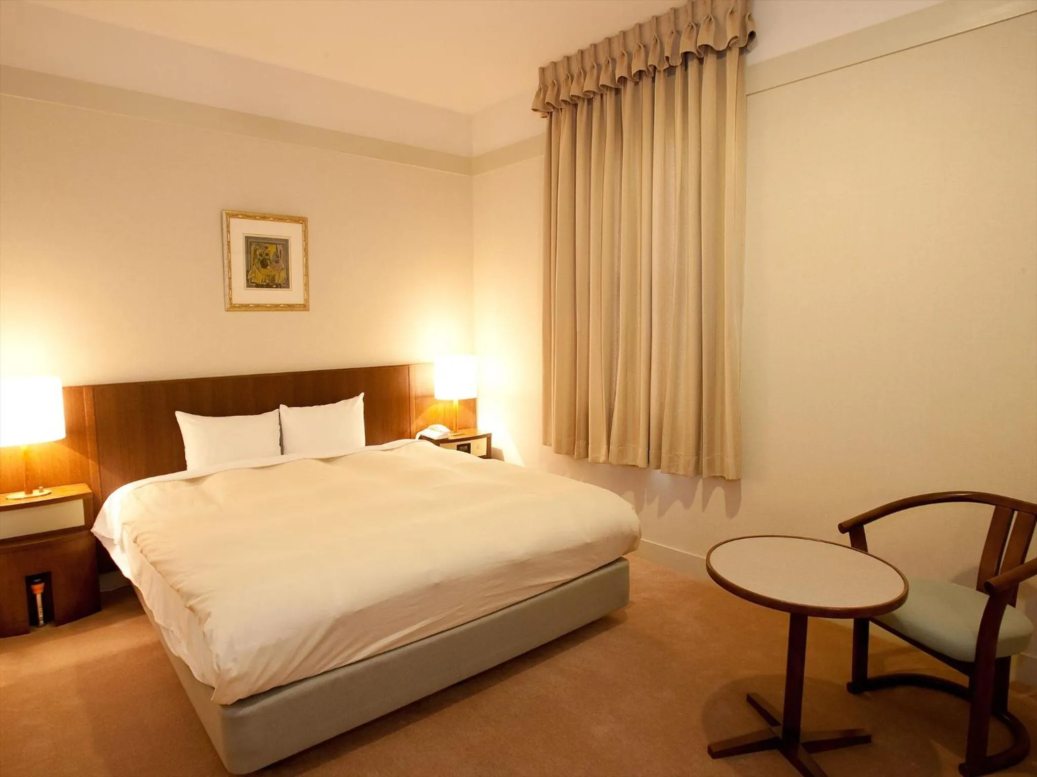 Bed in Yugashima Golf Club & Hotel Resort