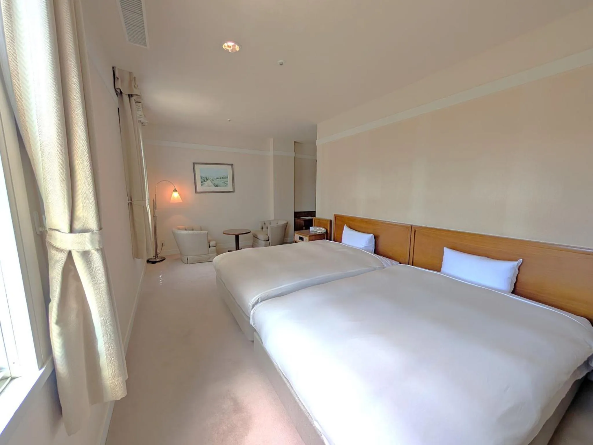 Bed in Yugashima Golf Club & Hotel Resort