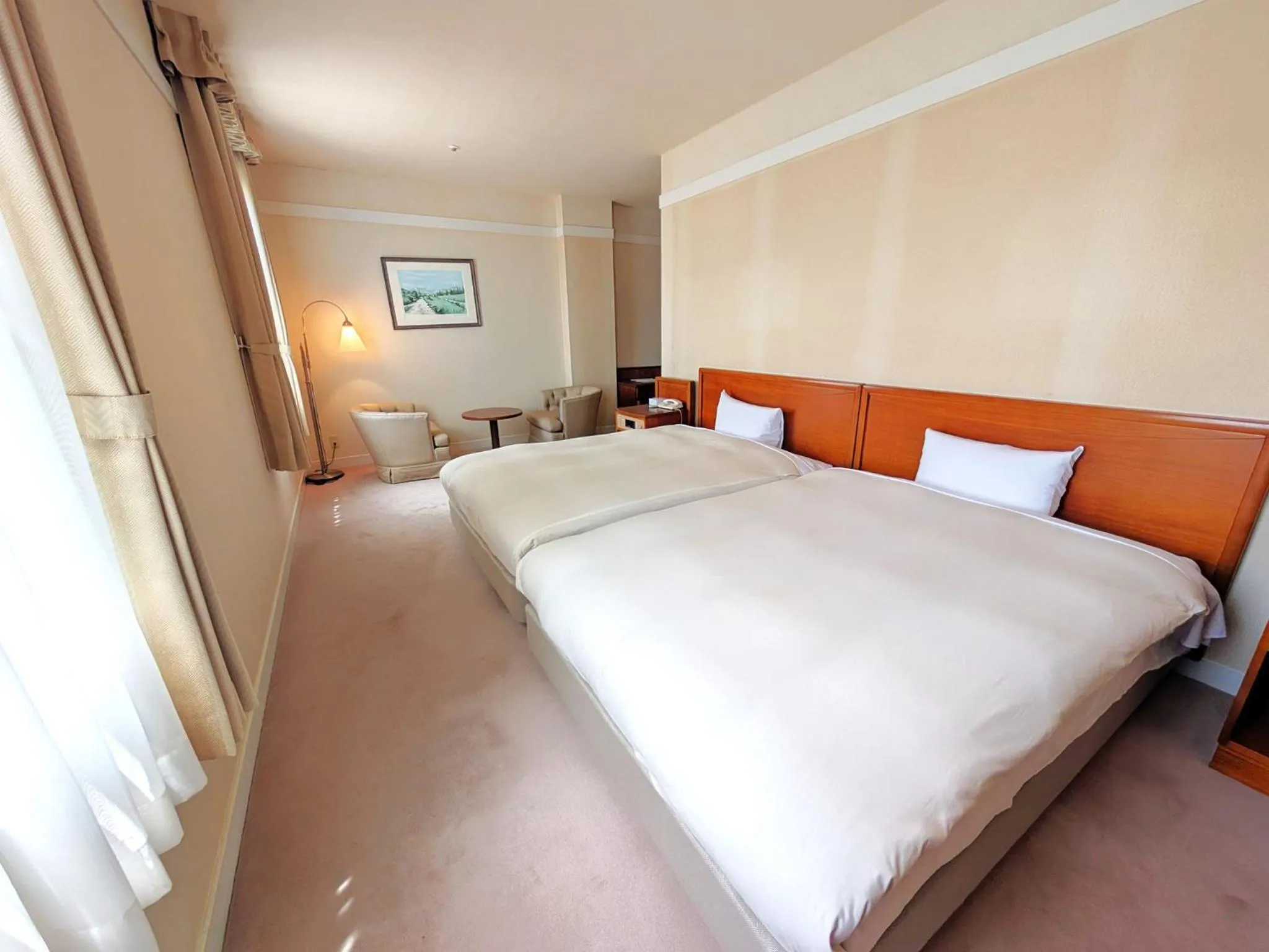 Bed in Yugashima Golf Club & Hotel Resort