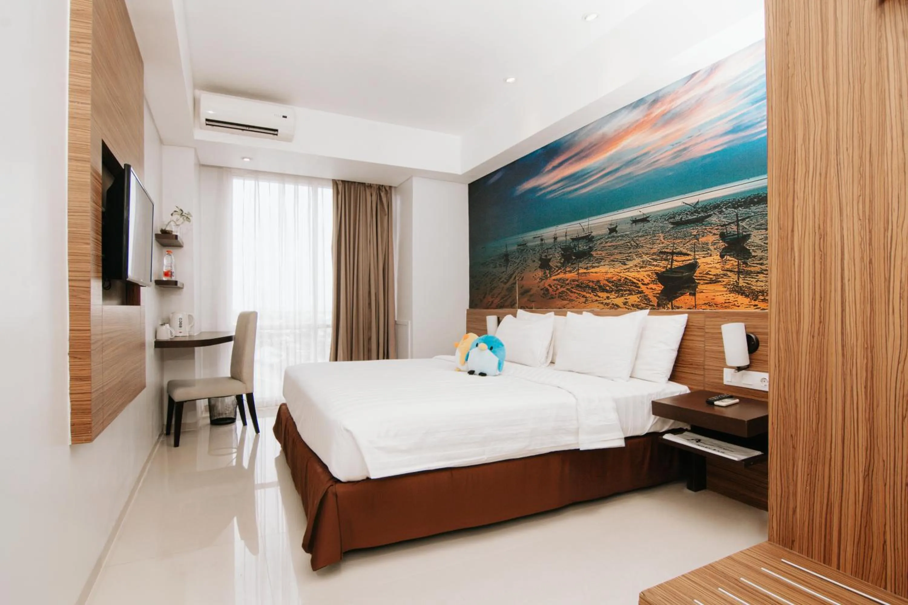 Bed in Ascent Premiere Hotel and Convention