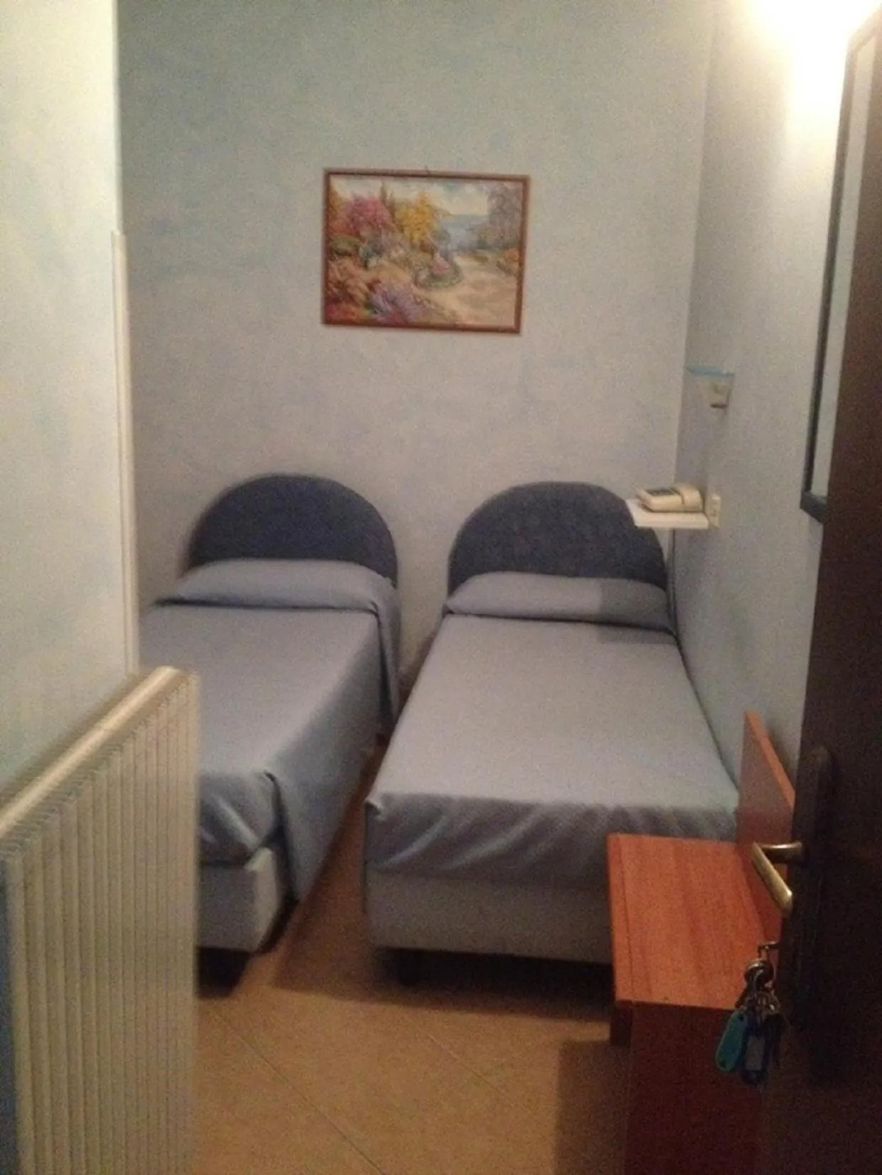 Bedroom in Hotel La Milanese