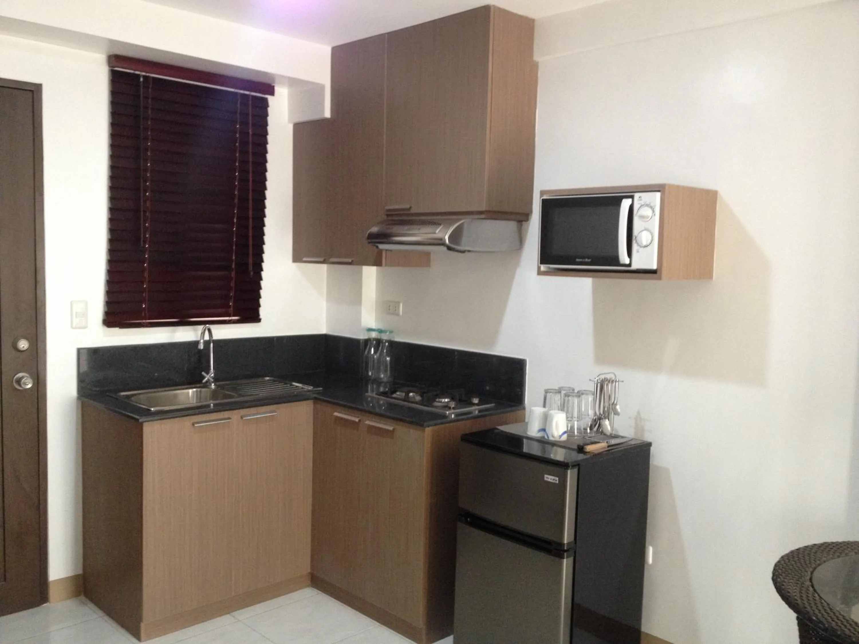 Kitchen or kitchenette in Anahaw Studio Suites
