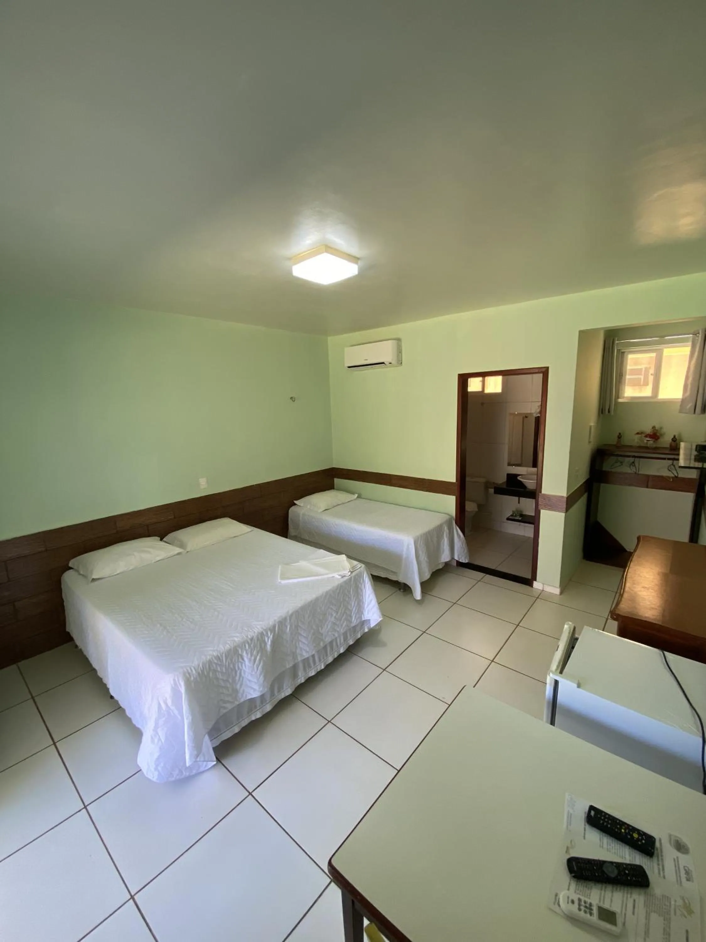 Property building, Bed in Pousada Gruta