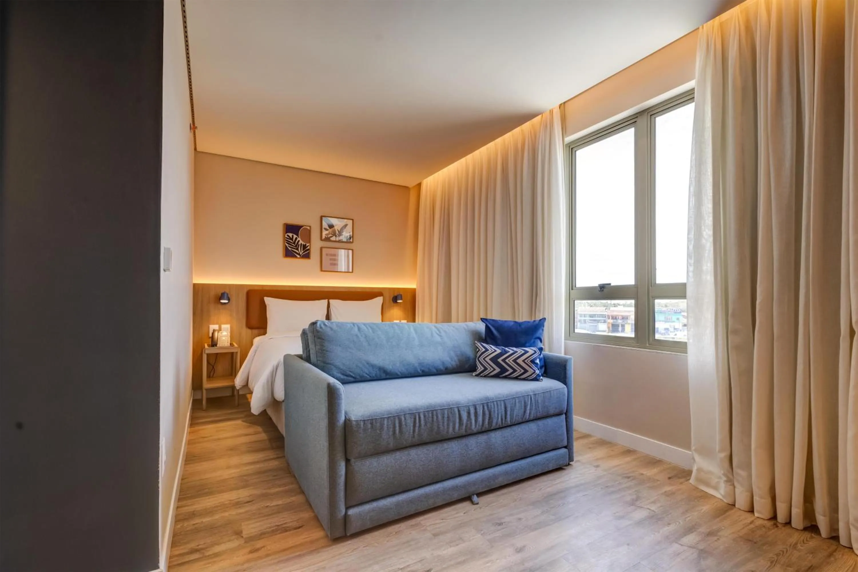 Living room in Hampton By Hilton Caraguatatuba Serramar