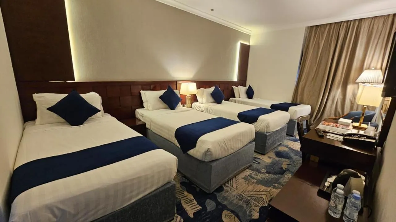 Bed in Jiwar Al Saha Hotel