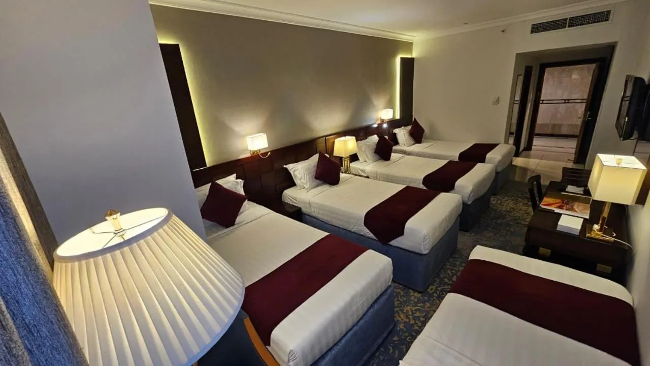 Bed in Jiwar Al Saha Hotel