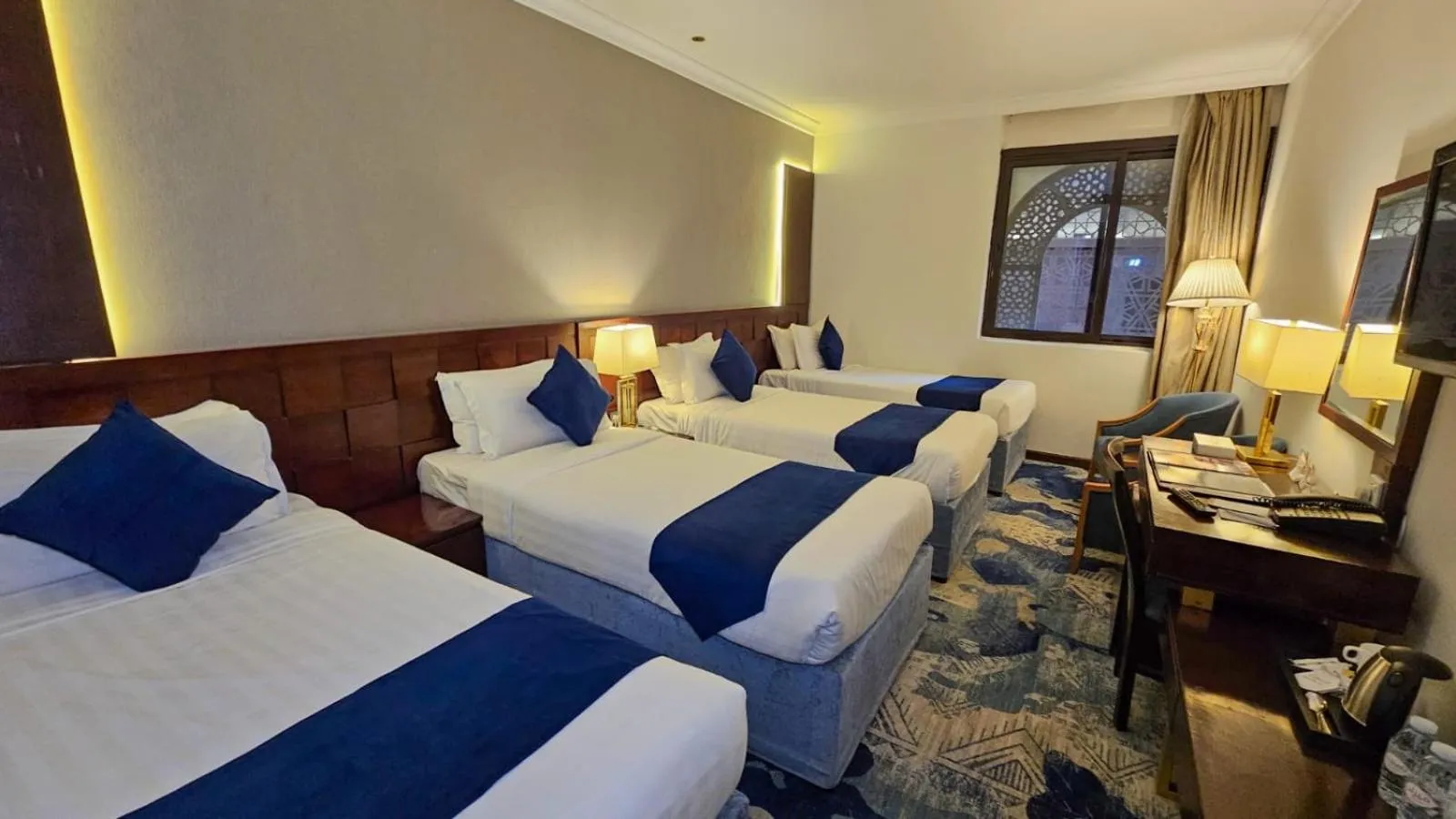 Bed in Jiwar Al Saha Hotel