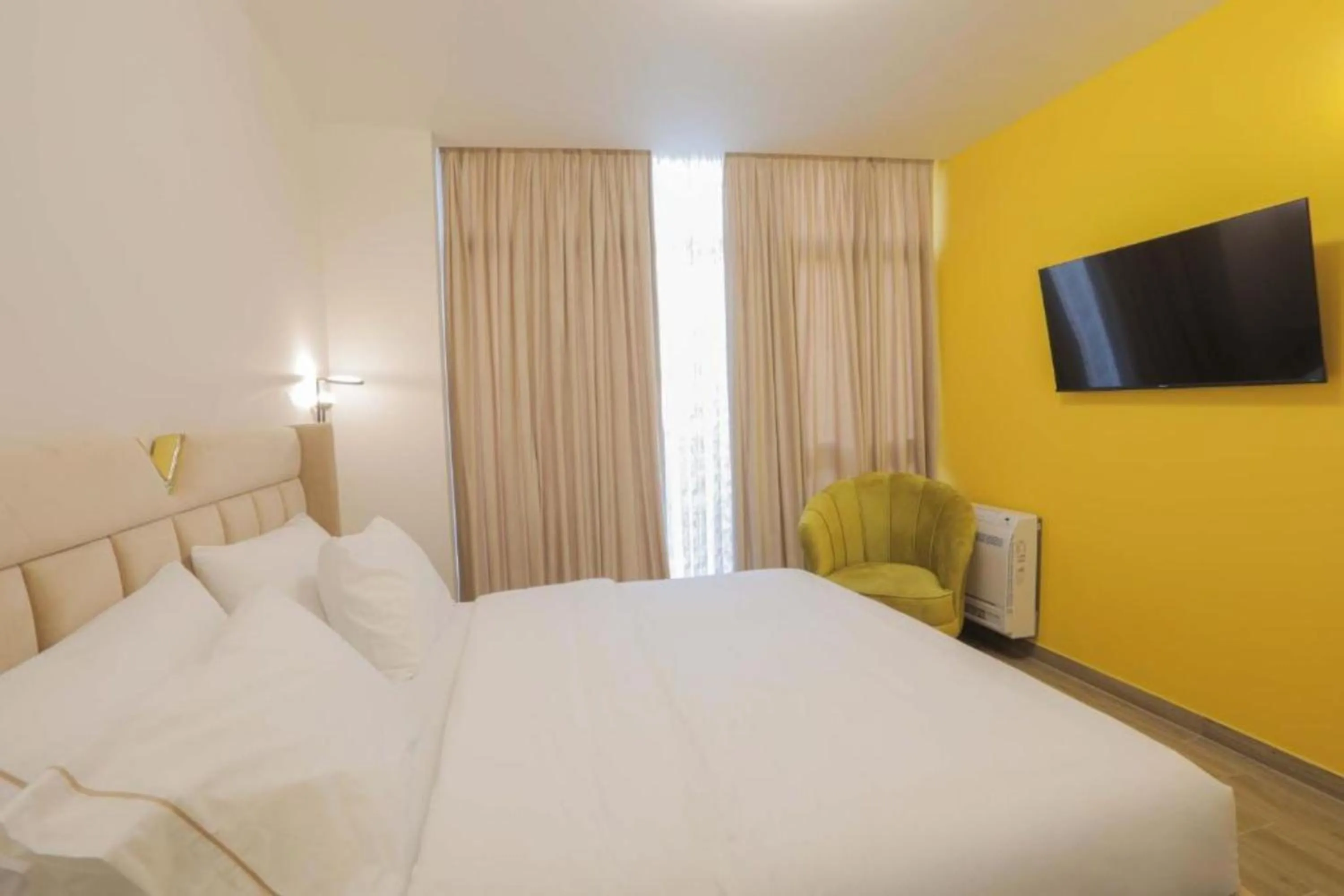 Bed in OLIA Residence