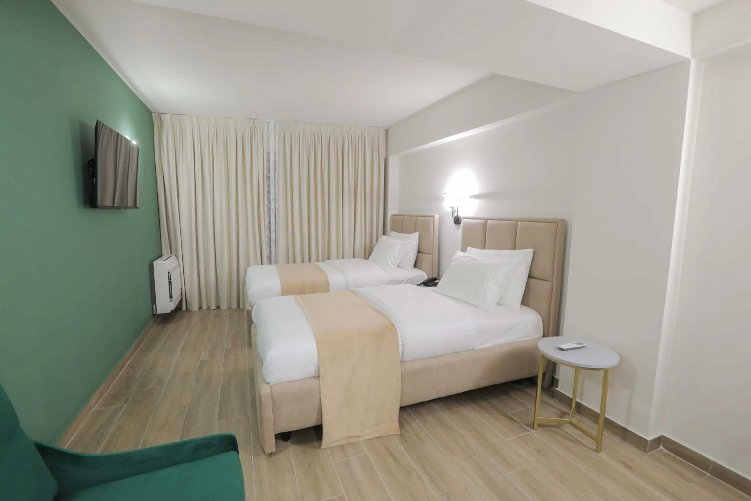 Bed in OLIA Residence