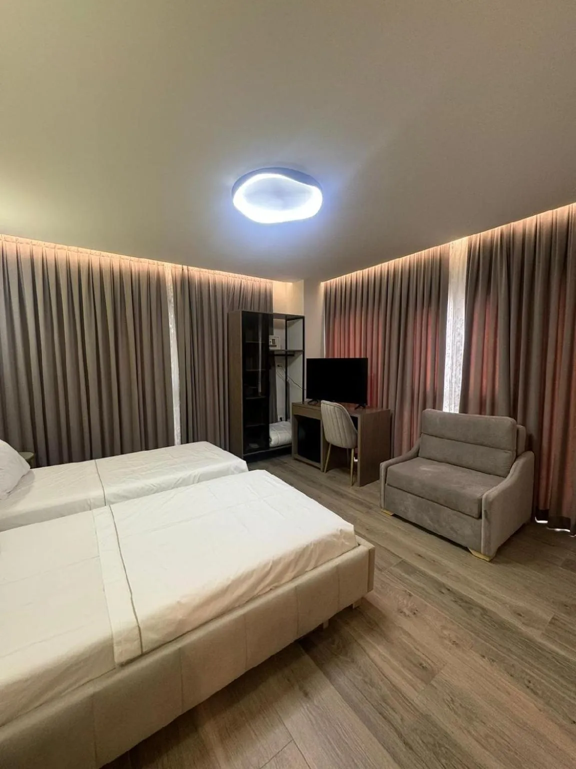 Bed in OLIA Residence